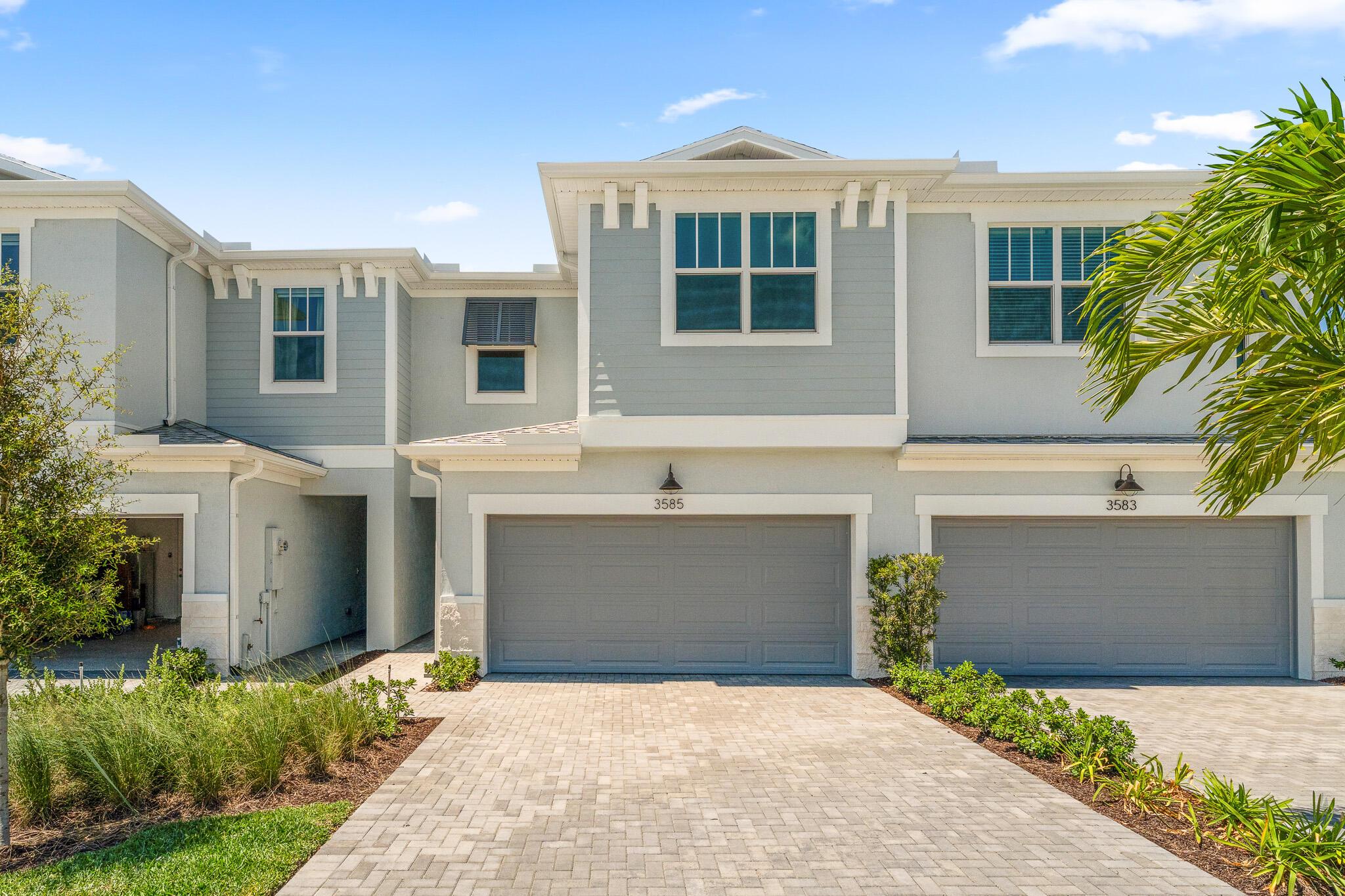 The Aqua is a one-of-a-kind, 1,778 sq. ft. floorplan that is versatile and perfect for everyday living. This townhome will only be found on the interior block of homes, with a porch in front and private covered lanai in the rear. A large kitchen on the side of the home lends itself to a desirable amount of cooking and counter space in addition to cabinetry lining the walls. You'll find in the Aqua the three double windows which make most of our plans at Avila special, enjoying the bright airy feeling that comes in with the natural light. Upstairs, find a good separation of space with an owner's suite and bath in the rear and secondary beds and bath in the front.