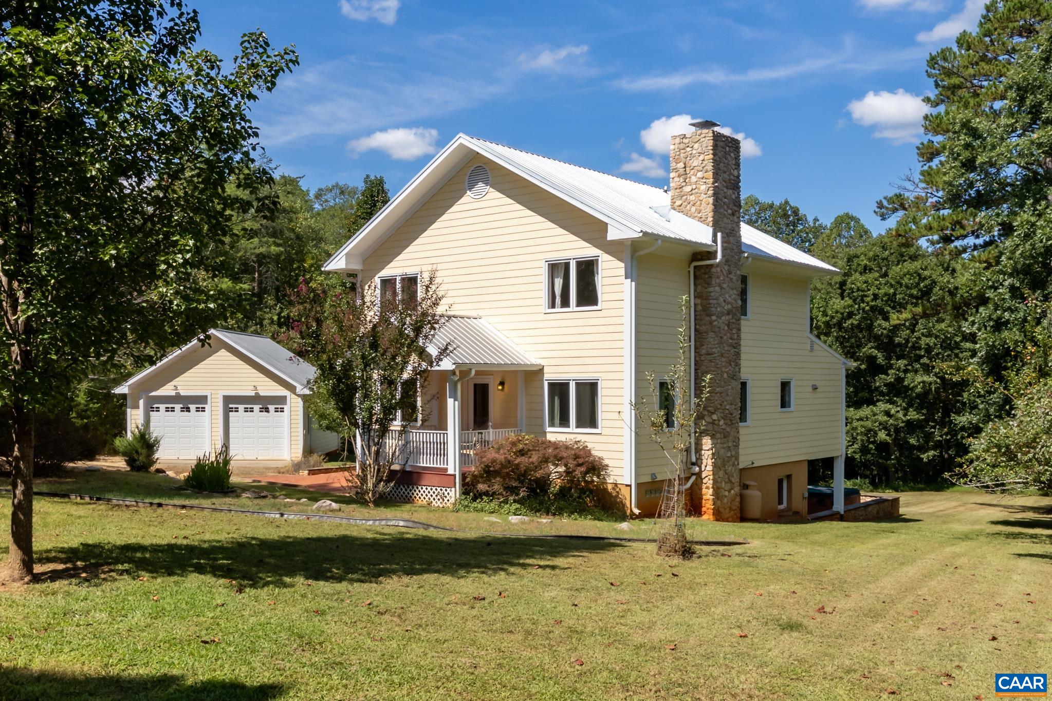 Charming hidden gem in the heart of Ivy. Just minutes to Murray Elementary and Ivy Depot. 10 Minutes from Charlottesville. This 3 bed/4.5 bath farmhouse have 3 suites all with full bath, one on the first floor and two upstairs. Two Fireplaces with River Rock Chimney. Two Primary bedrooms upstairs sharing the sitting/family room. Oak kitchen counters and Pine&Cherry floor all come from hardwoods harvested on site. Geothermal and a separate kitchen in the basement. The 4 acre lot provide level lawns and winter mountain views. Detached garage provide two car  parking and extra storage space. All furniture and appliances are included. Outdoor hot tub is conveyed 'as is'.