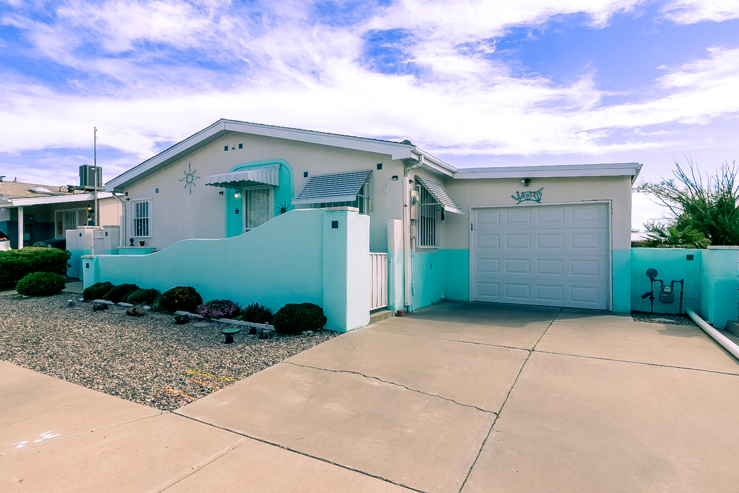 Original family owned & exceptionally well-maintained manufactured home on a permanent foundation. Interior features tape & texture sheetrock walls & no carpet. Flooring consists of laminate wood & vinyl. Refrigerated AC & central forced-air gas heat. Kitchen offers abundant countertop space, freestanding electric range, built-in microwave, dishwasher, vented exhaust hood & a large skylight for natural light. Primary suite incls dbl sinks, garden tub & a separate walk-in shower. Spacious secondary bedrooms split from the primary & feature spacious walk-in closets. Updated 3/4 bathroom serves the secondary bedrooms. Ceiling fans throughout. Exterior is finished w/stucco & siding & incls upgraded vinyl thermal dbl pane windows. Pitched asphalt roof.