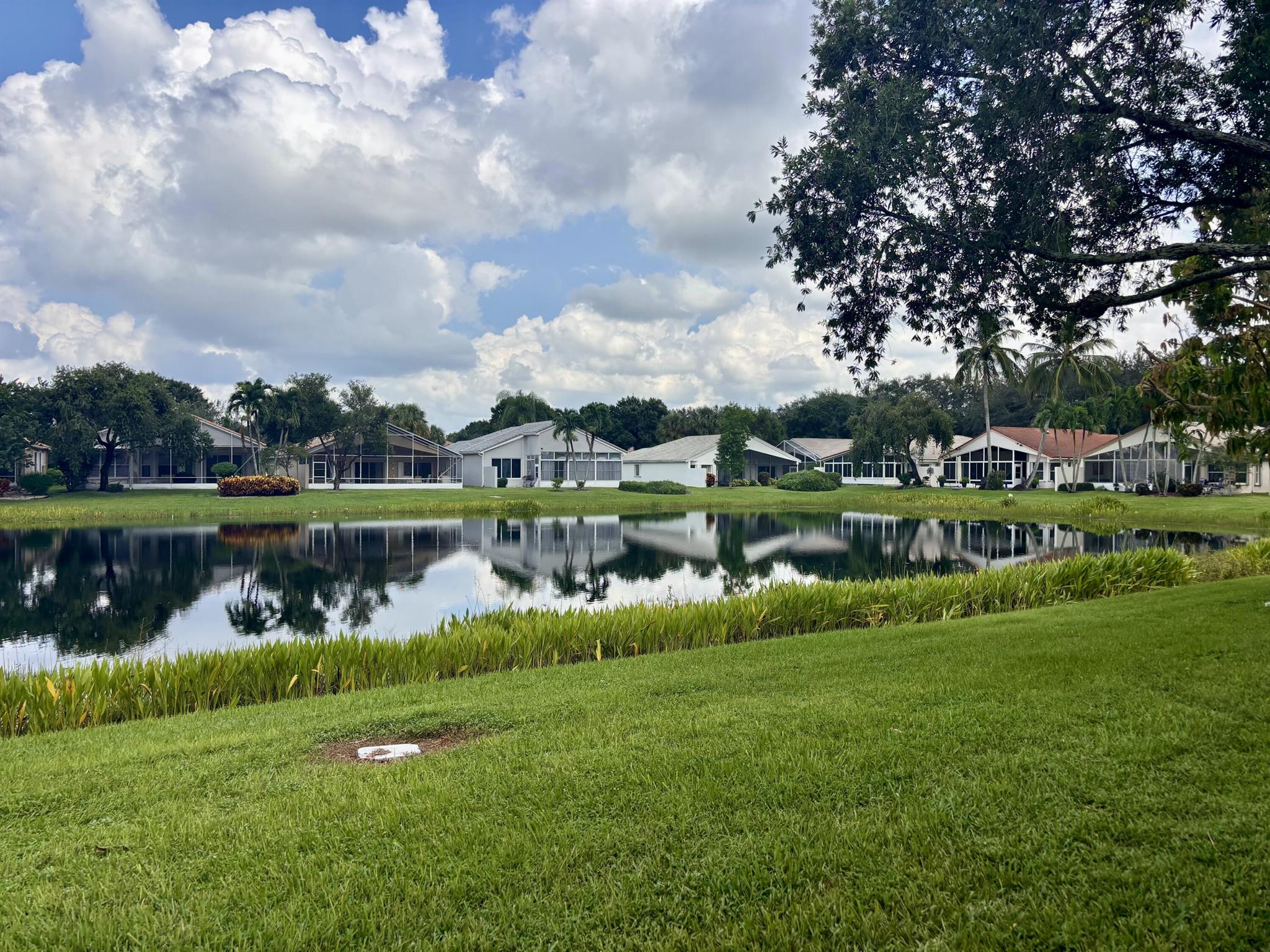 COMING SOON!  Interior Photos Coming Soon!!  A not-to-be-missed opportunity to own a like-new, completely upgraded 3BR/2BA home with 1,852 sq ft of refined living space. No detail has been overlooked! Enjoy complete storm protection with FULL IMPACT WINDOWS & DOORS, ROOF Sept 2025, A/C 2025, and HWH 2025 - offering both peace of mind & elevated curb appeal. The chef's kitchen is a showpiece with top-tier stainless appliances, wine fridge, dramatic designer hood, custom cabinetry & premium finishes. Designer-curated bathrooms include a freestanding tub and frameless walk-in showers, evoking spa-like luxury. Enjoy year-round living in the oversized enclosed patio with stunning water views perfect for relaxing or entertaining! Located in the prestigious, pet-friendly community of Valencia Lakes.
Valencia Lakes offers a newly renovated clubhouse with caf+¬, pools, spa, tennis, pickleball &amp; more. Pet-friendly, gated, close to beaches, dining &amp; shopping. Truly turnkey!