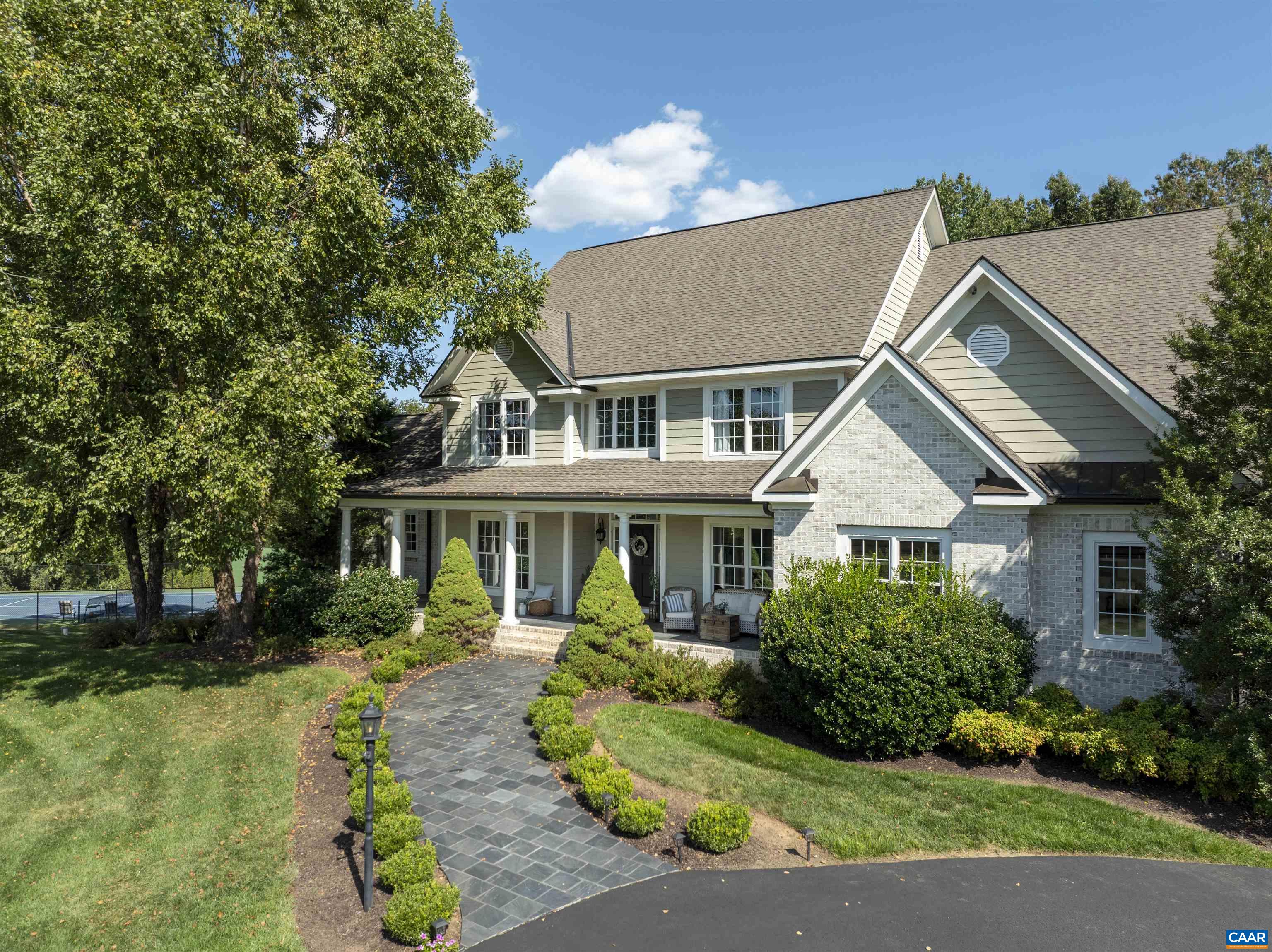 Top Quality, Custom Home in Ivy set on 5 acres with mountain views....Extended living space with swimming pool and full size tennis/sport court....Covered terrace pavilions overlook expansive lawn and recreation areas. Bright, expansive interior spaces flow comfortably...The vaulted great room opens to the gourmet kitchen and breakfast room...2 primary suites on the first floor...The upper floors feature 3 additional suites (with fabulous closet spaces) and a billiard room... Terrace level features a family room with bar, movie room, craft/hobby room, home office and a full bath... Easy access mechanical room houses the Geothermal system and still room for a storage room...Central vacuum system, irrigation system, & invisible fence...