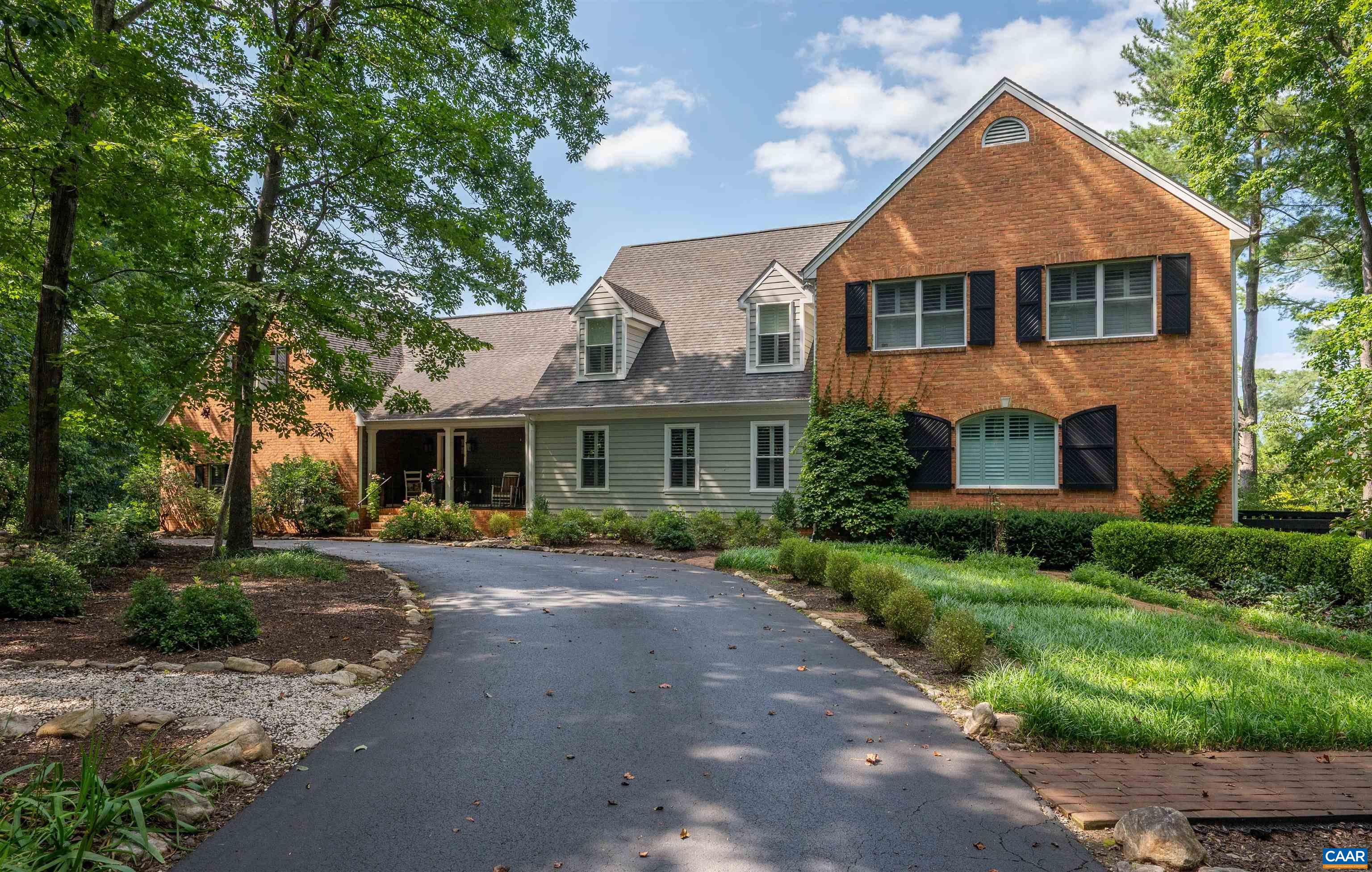 OPEN HOUSE Sunday October 5 1pm - 3pm.  Immaculately maintained family home with splendid gently rolling mountain views. The private and manageable 7+ acre parcel is landscaped with mature plantings that include fruit trees, hydrangeas, roses and more with three board wired fencing and a vegetable garden. Main-level primary suite has two custom closets and a stunning bathroom featuring walk-in cypress wood surround shower, standing cast iron tub, Grohe fixtures, double vanities, and separate WC and vanity room. The primary suite is enhanced with its own sun porch that includes a gas fireplace. The open chef's kitchen has an 8-burner gas Thermador range with double ovens plus an electric wall oven and microwave. The second floor has three private suite bedrooms with 2.5 en-suite bathrooms, and two guest bedrooms that share a full bath. All doors are solid wood and all CA custom closet fit-outs. Heart Pine floors, hand-set Chippendale railings and plantation shutters throughout. Whole house generator. Large side access three car garage. Detached equipment shed with dog kennel and fenced in yard. Lower level has large guest room, full bath, direct access to pool, and work from home office. A terrific family home.