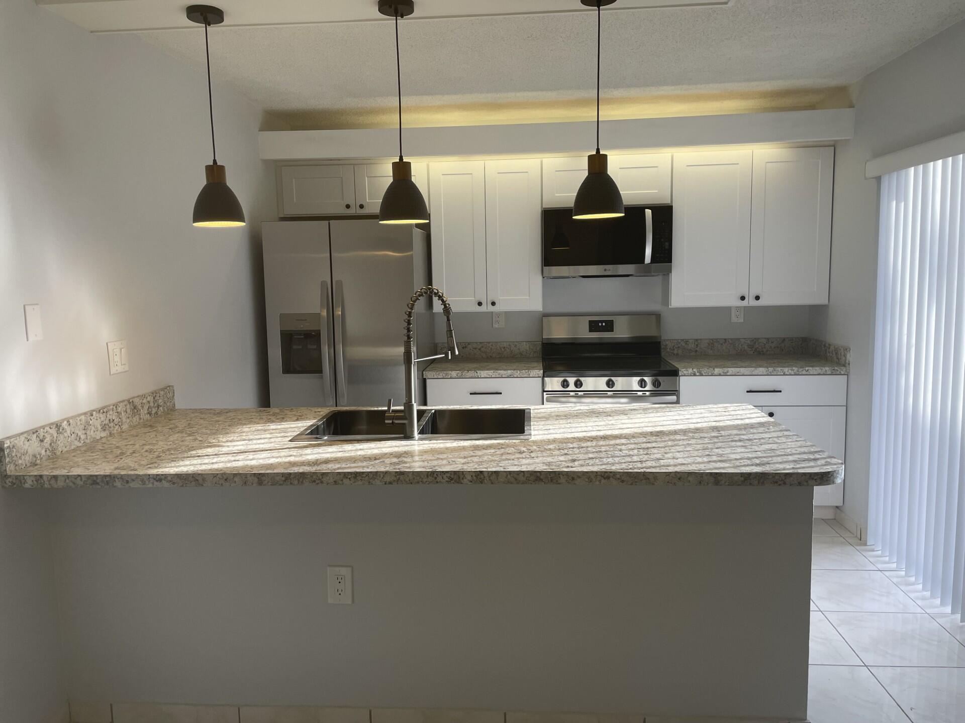 6608 66th Way Unit , West Palm Beach, Florida 33409