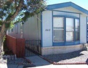 Just painted interior and some new carpet.  2BD and 2BA at separate  either end. Living room and kitchen in between.  Owned Lot.  Mortgage loans should work OR seller may finance short term with good down  payment. $160/mo.  HOA fee includes water , sewer, garbage, pool, clubhouse and common areas maintenance.