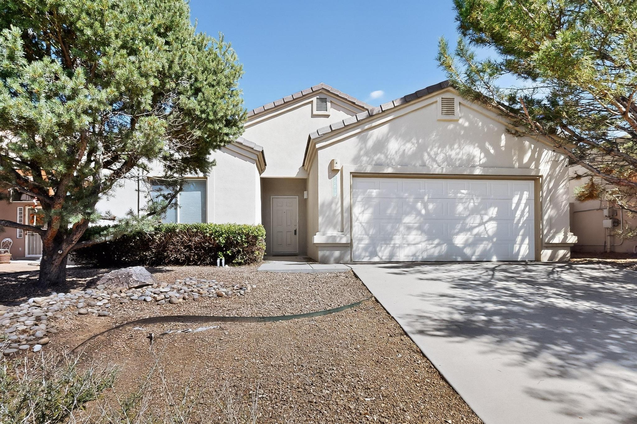 Beautiful single story Charter home in outstanding location! This home is in move-in condition and features fresh paint, and all new LVP flooring, stainless steel appliances and garage door.  It has a wonderful open floor plan with high ceilings and cheery natural light. The backyard is spacious and has mature trees and lovely patios to enjoy the outdoors. With easy access to I-40, restaurants and St. Pius, the location is hard to beat.