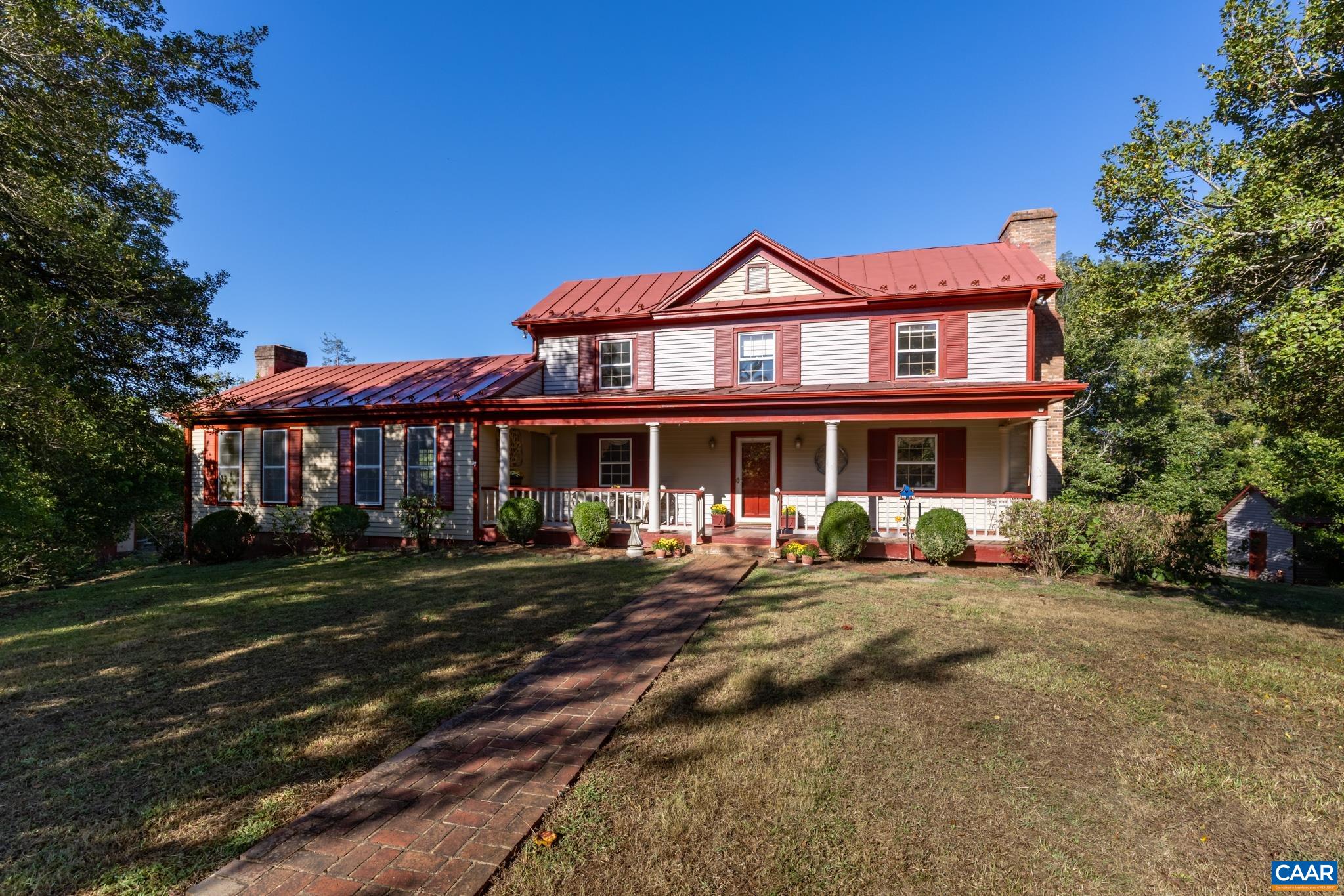Brokers Open 10/9/25  1-4 PM Charming historic 1900 Virginia Farm House .This property is nestled on almost 7 serene acres, offering stunning Blue Ridge Mountain views and complete privacy. With 2,724 sq ft  this home has been lovingly maintained and preserved by the same family for over 45 years. It seamlessly blends timeless country allure with modern amenities.  Flooring is original wormy Chestnut. In the 1980s, the home underwent a complete restoration. It features two screened-in porches, each offering unique views, a large sundeck perfect for enjoying nature, and a covered front porch for relaxing. Several outbuildings and a whole-house generator provide added comfort & convenience. Beautiful inground pool. The property also includes a huge barn with exciting potential, whether for a workshop, an event space, or for selling its reclaimed wood. This farm offers a dream for history buffs or those seeking a tranquil rural retreat. Its proximity to Nelson County’s orchards and wineries, and Charlottesville’s vibrant scene makes it perfect for a primary residence, a vacation home, or even a bed-and-breakfast catering to tourists. With some cosmetic updates, this lovingly cared-for farmhouse will truly shine as a modern classic. .