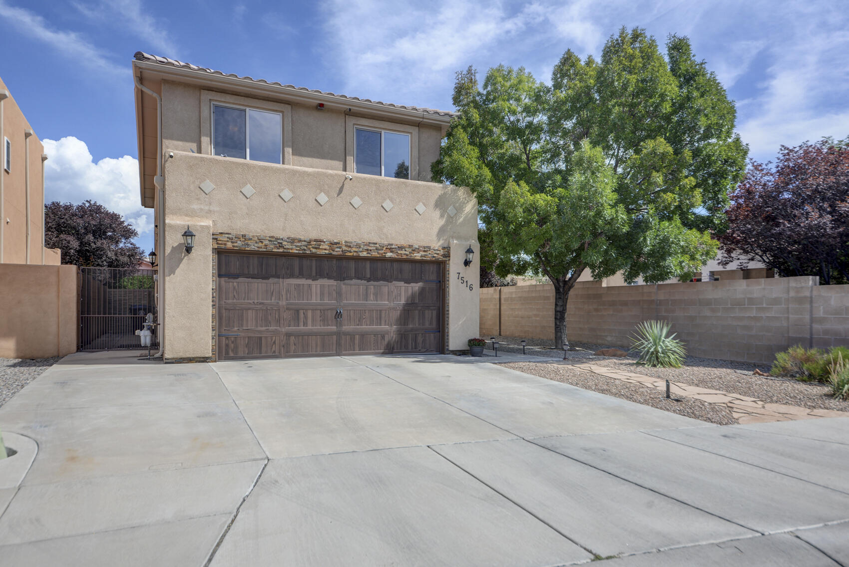 Welcome to this stunning, one-of-a-kind modern residence in the heart of the North Valley. Thoughtfully designed for both style and comfort, this 3-bedroom, 3-bathroom home is the perfect blend of sophistication and everyday livability.Step inside to discover beautiful hardwood flooring that flows throughout an open-concept living space, ideal for entertaining or relaxing in style. The gourmet kitchen and seamless indoor-outdoor layout make hosting effortless, while the expansive backyard provides a private oasis for unforgettable gatherings with family and friends.The luxurious primary suite is a true retreat, featuring a spa-inspired bathroom and a walk-in closet fit for a queen. With designer finishes, curated details, and an unbeatable location, this home is truly a must-see