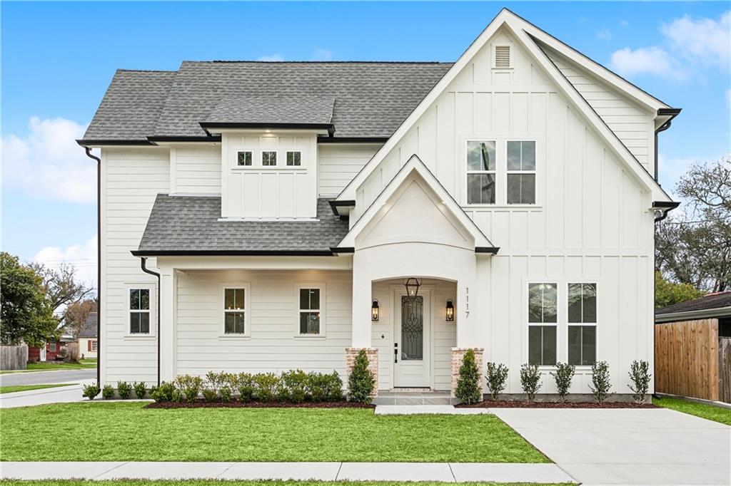 NEW 5 BD 4 BA modern farmhouse sit on a CORNER lot with SLATE porch, 22” COPPER GAS lantern & OLD CHICAGO brick columns. Step into this CUSTOM built home designed w/GOLD finishes, NATURAL wood tones & reclaimed ANTIQUE doors that showcase rare woodwork with Art deco mosaic & stained glass. Captivating kitchen w/CALACATTA GOLD QUARTZ, honed marble backsplash, 36” VERONA gas stove, custom hood, pot filler, BOSCH dishwasher & SHARP microwave drawer. A stunning 42” DOUBLE WATERFALL island with farmhouse sink, bell glass shaped pendants & seating. One of a kind dining has 11 ft CRISSCROSS COFFERED ceilings, French Oak & Champagne gold farmhouse CHANDELIER & WET BAR featuring a wine rack & built-in wine display niche. Enjoy entertaining in the OPEN LIVING room which features a beautiful FIREPLACE with Cypress mantle surrounded in shiplap & Quartz. Exquisite 1st floor PRIMARY SUITE offers a walk-in closet, 2 independent white quartz vanities & matte black finishes. Relax under your CRYSTAL CHANDELIER in your 71” SOAKER tub w/built-in wall niche & handheld shower, or enjoy the RAINFALL SHOWER system w/a frameless CORNER glass enclosure. Includes 1st floor guest bedroom/office + full bath designed w/EGYPTIAN reclaimed door, marble farmhouse vanity, lattice mosaic flooring & walk-in shower. UNIQUE HIDDEN pantry & laundry area behind the sliding antique door opens to an Enchanted Forest green shiplap wall, crown molding & shelving. ALL 3 upstairs bedrooms include WALK-IN CLOSETS, 2 of which feature DESK/NICHE AREAS & the 3rd has 11 ft ceilings w/a 60” ceiling fan. Host outdoor gatherings by adding a kitchen or indulge in quiet evenings under the COVERED PATIO & private backyard surrounded by a 6 ft tall cedar fence. ADDITIONAL FEATURES: Luxury vinyl wood flooring, White oak stairs, staircase chandelier, GUTTERS, tankless water heater, 2 Nest cameras, Ecobee thermostats, slab built on PILINGS, Showcase windows & 2 ATTICS! Plenty of parking w/front driveway & side circular drive