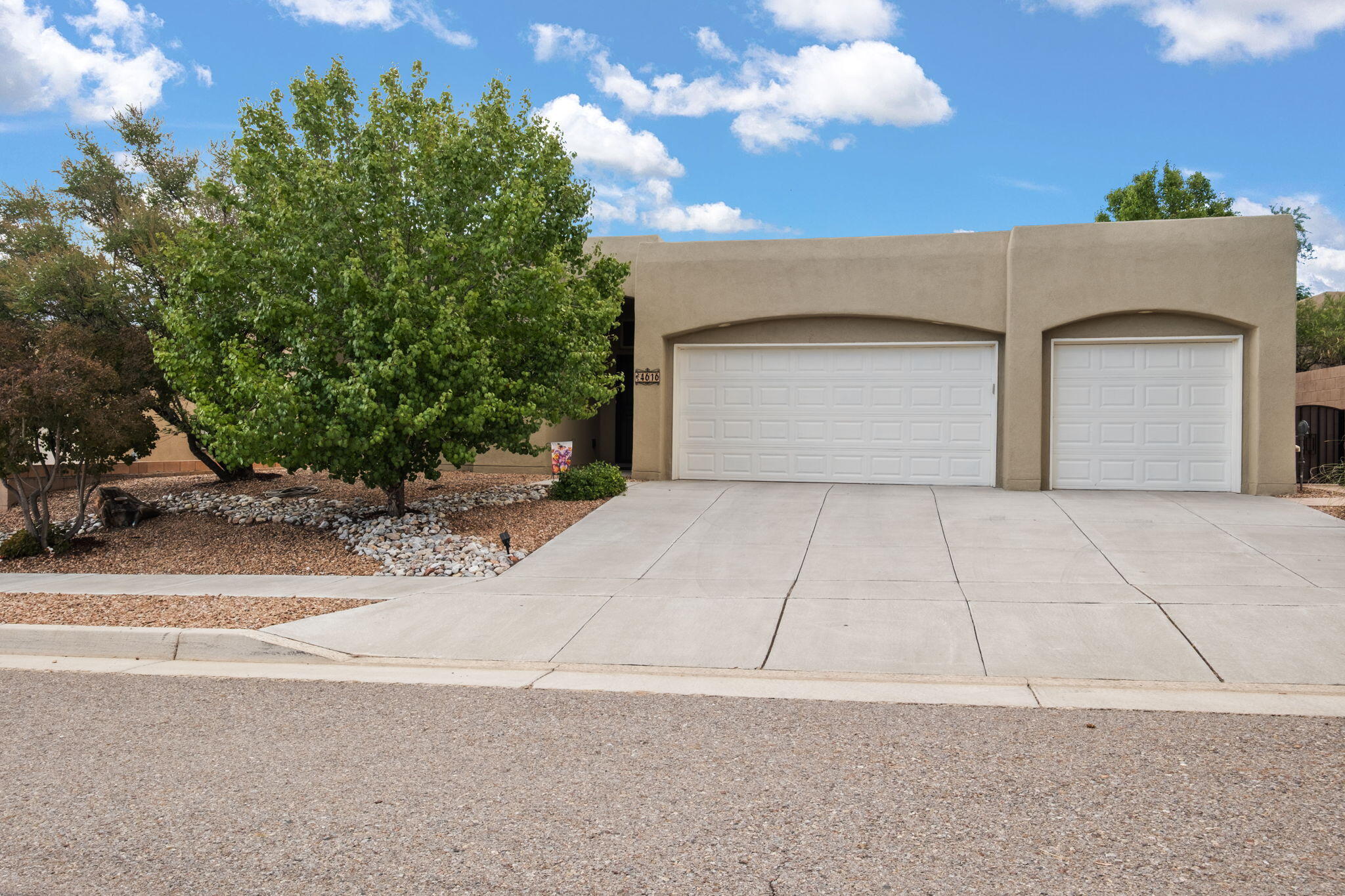 A stunning home that offers breathtaking Sandia Mountain views & exceptional curb appeal in the fantastic Andalucia community! Inside, you'll find a bright & spacious open floor plan, with vaulted ceilings & a gas log fireplace! The modern kitchen features ample storage spaces & breakfast nook, seamlessly flowing into the inviting living & dining areas. Retreat to the luxurious master suite with an en-suite bath, while additional bedrooms provide comfort for family or guests. Enjoy your private backyard oasis, complete with a covered patio, perfect for relaxing or hosting gatherings. Located in a vibrant community, you're minutes from shopping, dining, and outdoor recreational opportunities. Don't miss this chance to own a dream home--schedule your showing today!