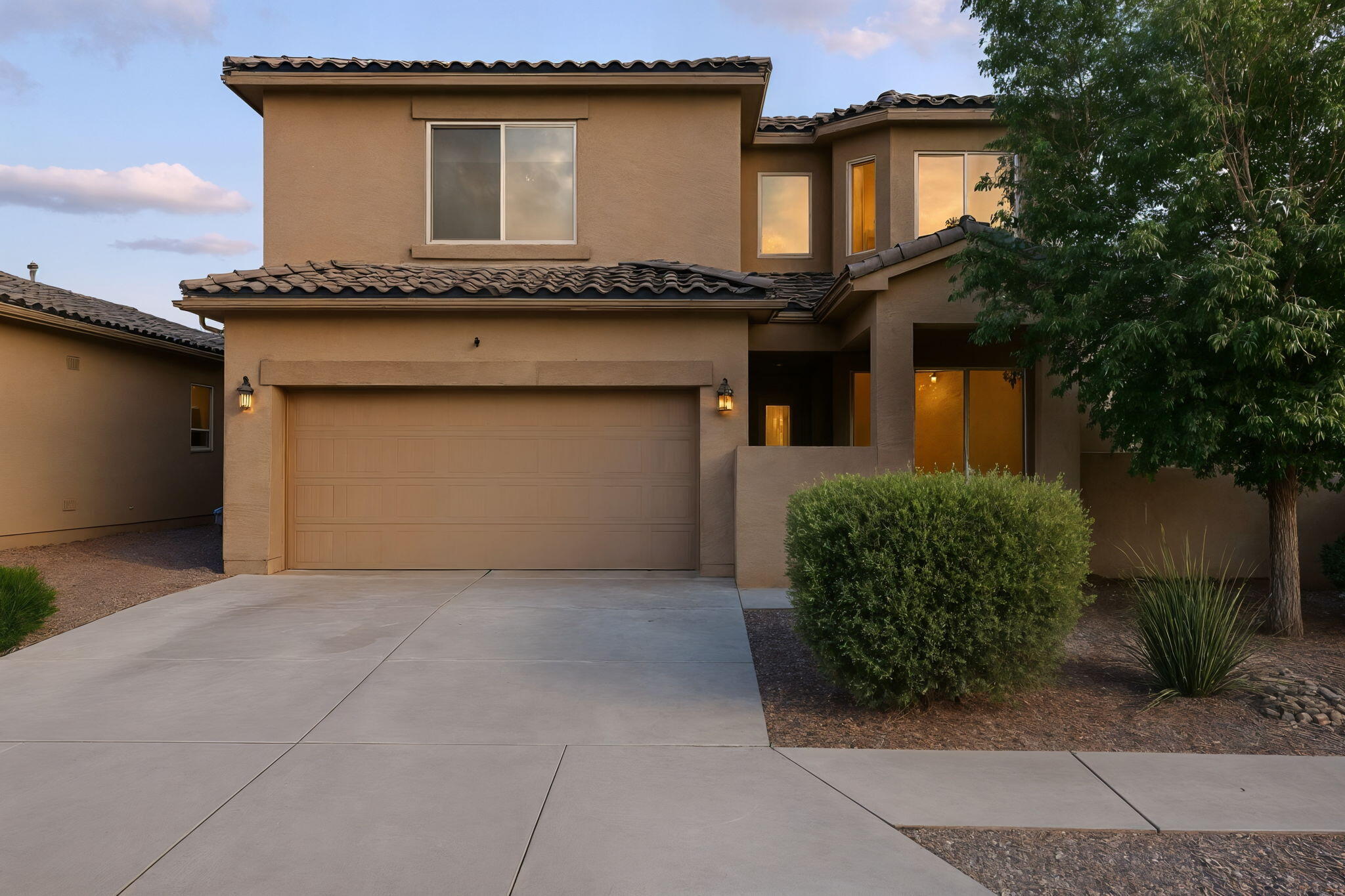 Welcome to this stunning, two-story home in The Trails, just moments from Volcano Vista High School. Offering 4 spacious bedrooms, 2.5 baths, a versatile study, and loft for an additional living space, this home truly has it all! The chef's kitchen boasts granite countertops, upgraded cabinetry with crown molding, stainless steel appliances, and a center island with bar seating that flows seamlessly into the dining and living areas. The owner's suite features a spa-inspired bath with a soaking tub, separate shower, and a generous walk-in closet complete with custom shelving and a shoe rack.Additional highlights include wood-look ceramic tile flooring, a covered back patio perfect for entertaining, a charming front courtyard, refrigerated air, tankless water heater.