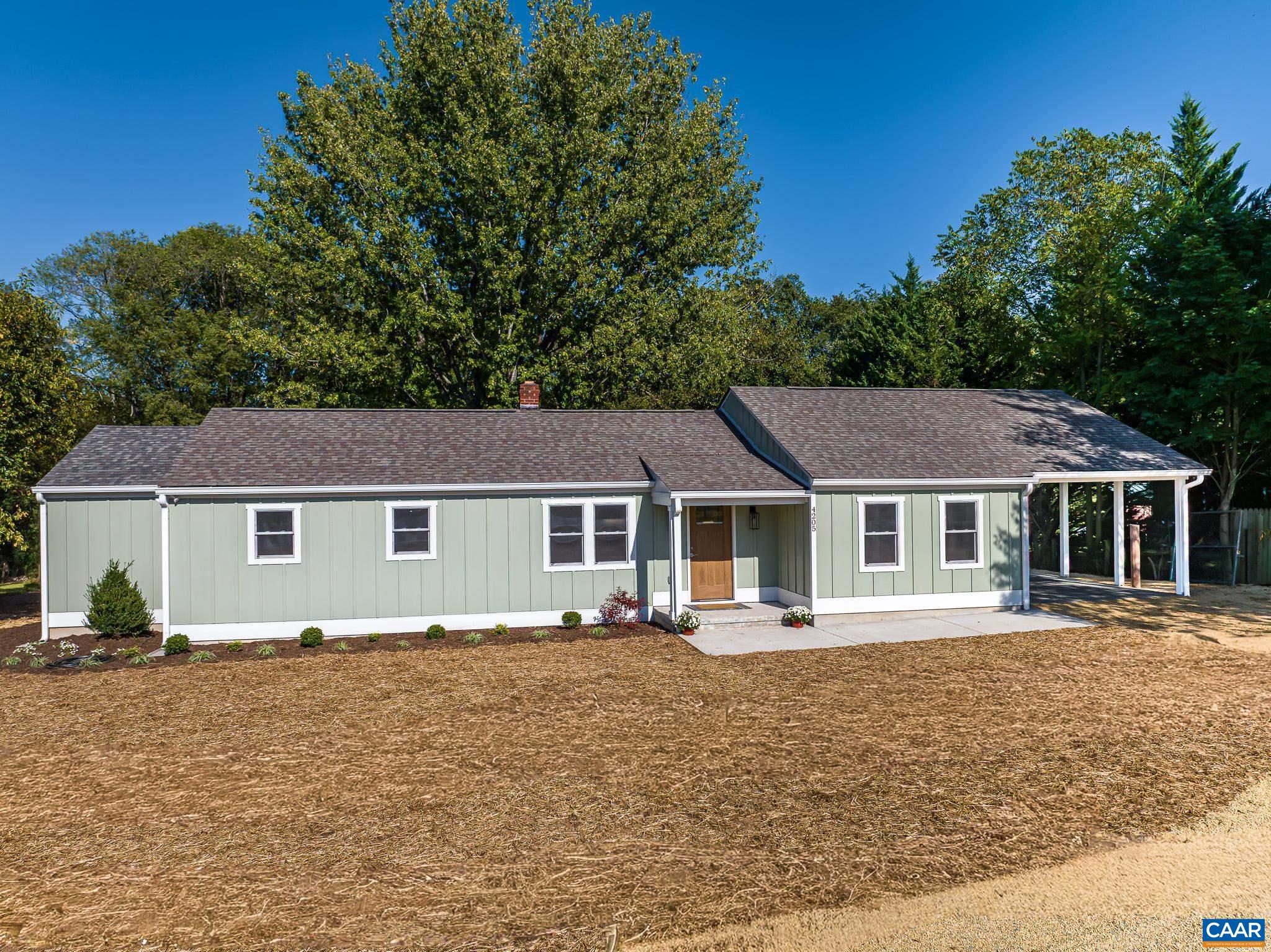 Reimagined, Open & Spacious- One Level Custom Built Home close to everywhere you want to be! Featuring 3 Bedrooms & 3 Full Bathrooms, Open Kitchen full of windows, Private Laundry Room entry from carport. Separate Dining Room with HUGE Deck leading to Large level yard. Literally Rebuilt in it's entirety from floor to ceiling & everything in between! Plumbing, Electrical, Insulation, Sheetrock, Flooring, Trim & Hardware, Appliances, Roof, HVAC, Windows, Doors, Water Heater, Gas Line, Well & Septic...Deck, Carport, Porch, Driveway, Walkway & even the Yard have been Redone!!  You Name IT & it's been upgraded! Specifications Sheet attached. Truly a Must see!