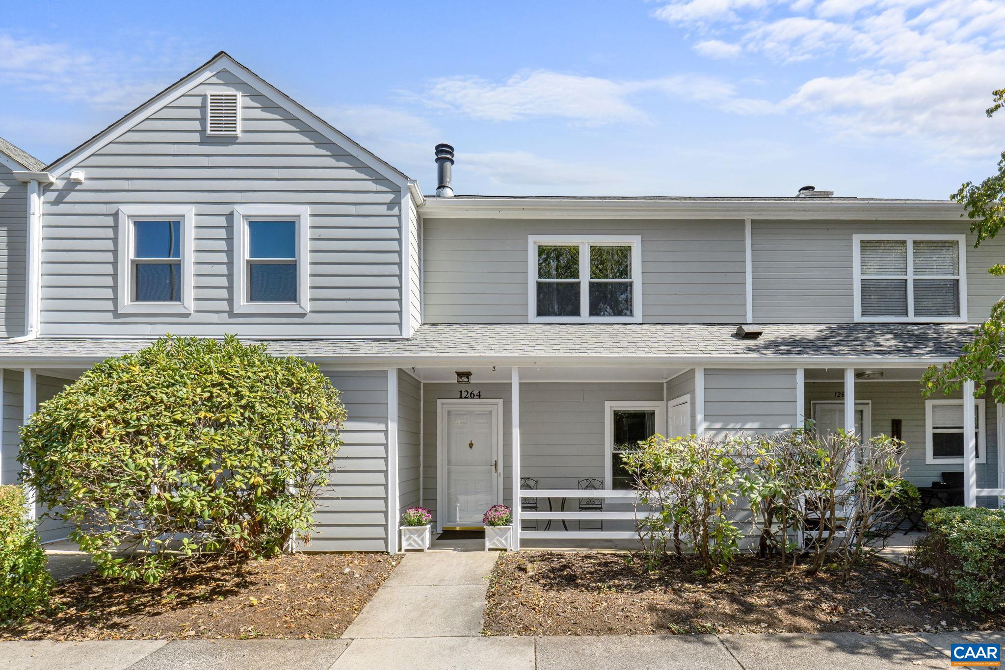 This low-maintenance 2 bed/1.5 bath townhome combines practical living with genuine charm, creating a space where you can truly unwind. The large open living/dining space has a sliding door out to the back patio - a perfect spot for dinner al fresco OR a place to enjoy seasonal Carter's Mountain views. Upgrades to the home include new washer/dryer (2024) water heater (2023),Hardie plank siding (2018), new sliding door and windows (2016). Plenty of parking at the front door with a storage closet right off the front porch.  Homeowner's Association fees cover trash pick up, lawn maintenance, snow removal, exterior painting, roof, gutters, professional management. Nearby lifestyle attractions are the 5th Street Station shopping center with Wegman's, Alamo movie theatre, restaurants and more, the Saunders-Monticello Trail, Piedmont VA Community College, downtown Charlottesville (less than 3 miles away), UVA medical center  and Martha Jefferson hospital (both less than 5 miles away!).  Whether you're purchasing your first home, downsizing, or seeking an investment opportunity, this townhouse delivers comfort without compromise in a truly prime location.