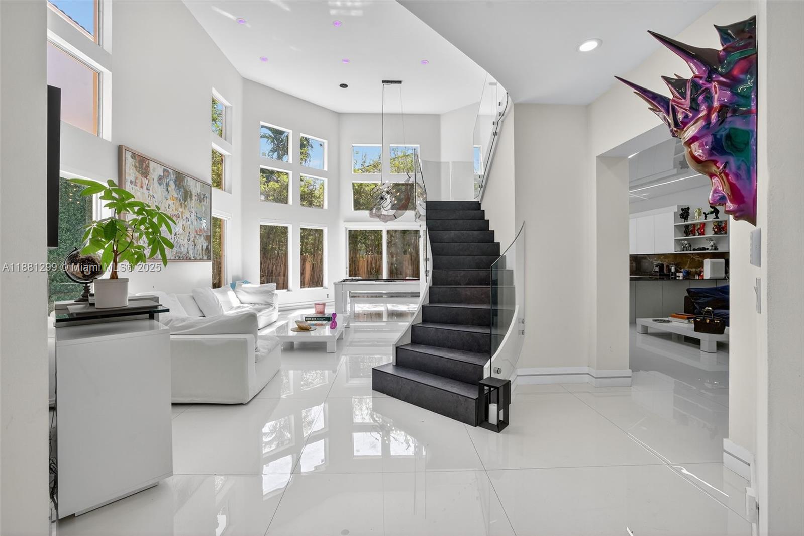 WOW! NEW NEW NEW! THIS MODERN DREAM HOME WAS 100% RENOVATED TO PERFECTION WITH NO EXPENSE SPARED. ALMOST $1M SPENT ON THE FINEST FINISHES THAT INCLUDE MIA CUCINA STATE OF THE ART GOURMET KITCHEN OPEN TO FAMILY ROOM w/WOLF DOUBLE SUBZERO REFRIGERATOR/FREEZER, CONTEMPORARY GLASS STAIR RAIL, ALL NEW TOP OF THE LINE BATHROOMS, IMPACT GLASS WINDOWS w/ELECTRIC SHADES, SMART HOME CUSTOM LIGHTING & LUTRON LIGHTS, CUSTOM CLOSETS, CUSTOM DOORS, ALL STUNNING FLOORS, STRETCH CEILINGS, AND SO MUCH MORE! TWO STORY HIGH VOLUME CEILINGS WITH TONS OF WINDOWS AND LIGHT. POOL & DECK. AIR CONDITIONED 2 CAR GARAGE. AN EXQUISITE GEM!
GATED COMMUNITY WITH COMMUNITY POOL/HOT TUB, KID'S PLAYGROUND, & ACCESS TO WATERWAYS MARINA, SHOPS, RESTAURANTS.