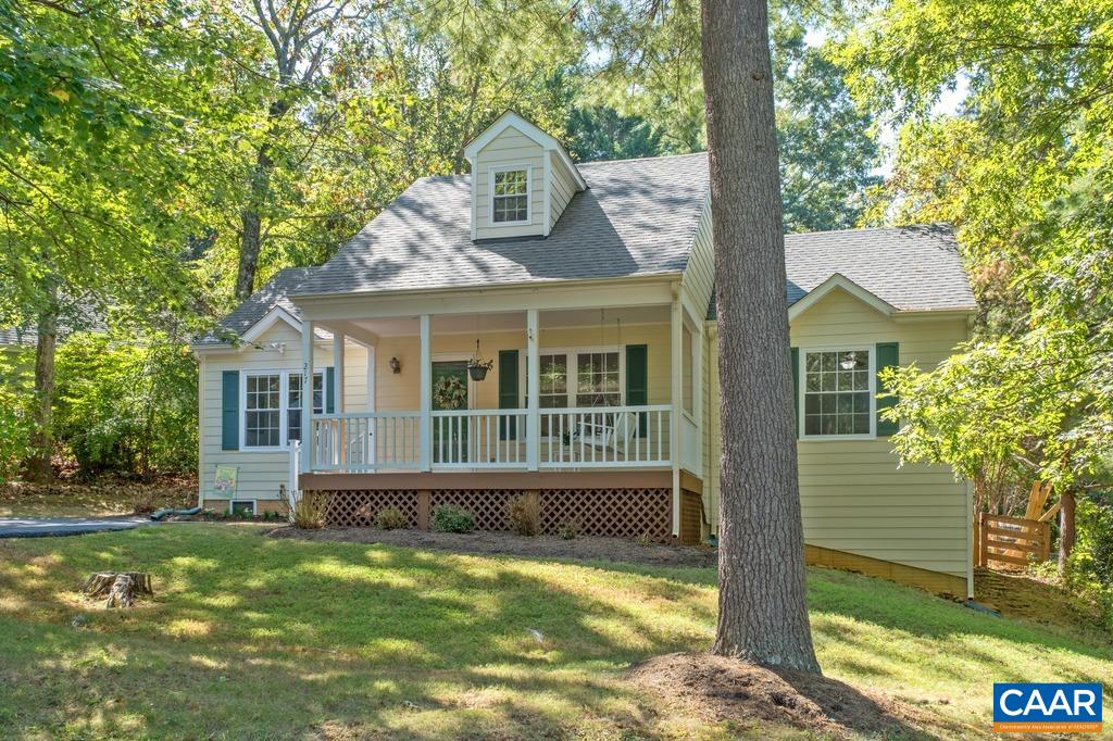 Adorable, lovingly maintained, light-filled cottage in the amenity rich Lake Reynovia community off Avon Street with quick access to 64/250,Downtown and UVA. Fabulous covered front porch with porch swing overlooking the manicured lawn. New luxury vinyl plank flooring throughout the home, and all plumbing updated in 2023. You'll love the expansive kitchen with peninsula seating and freshly stained cabinetry.  Large living room features gas fireplace, and opens to the dining area.  Two good-sized bedrooms share a remodeled full bathroom with walk-in tiled shower. Encapsulated crawlspace provides 800 sqft of dry locked storage space beneath the home, floored attic space provide even more additional storage, and fenced backyard provides space to run and play!