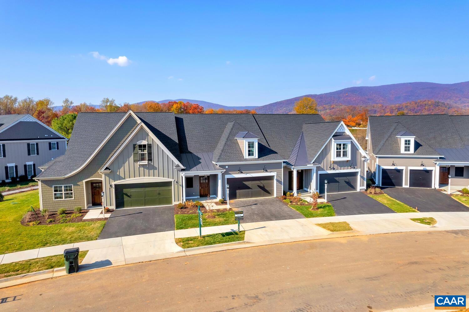 December Completion! This end-unit Afton Villa has everything you need for easy, main-level living. The open layout features a bright and spacious Great Room, a private owner’s suite, and a welcoming Kitchen and Dining area—perfect for everyday life and entertaining. There’s also a handy Pocket Study and a Screened Porch that backs to trees, giving you peaceful views and extra privacy.    Upstairs, you’ll find two more bedrooms, a full bath, and a cozy loft space—great for guests, hobbies, or just hanging out. The walkout basement can be finished to add even more spaces such as: an expansive Rec Room, a fourth bedroom, and another full bath. Plenty of space for everyone to spread out and feel at home!   Enjoy our thoughtfully included features, 2x6 exterior walls, custom Mahogany front doors and so much more. (Photos of similar home)