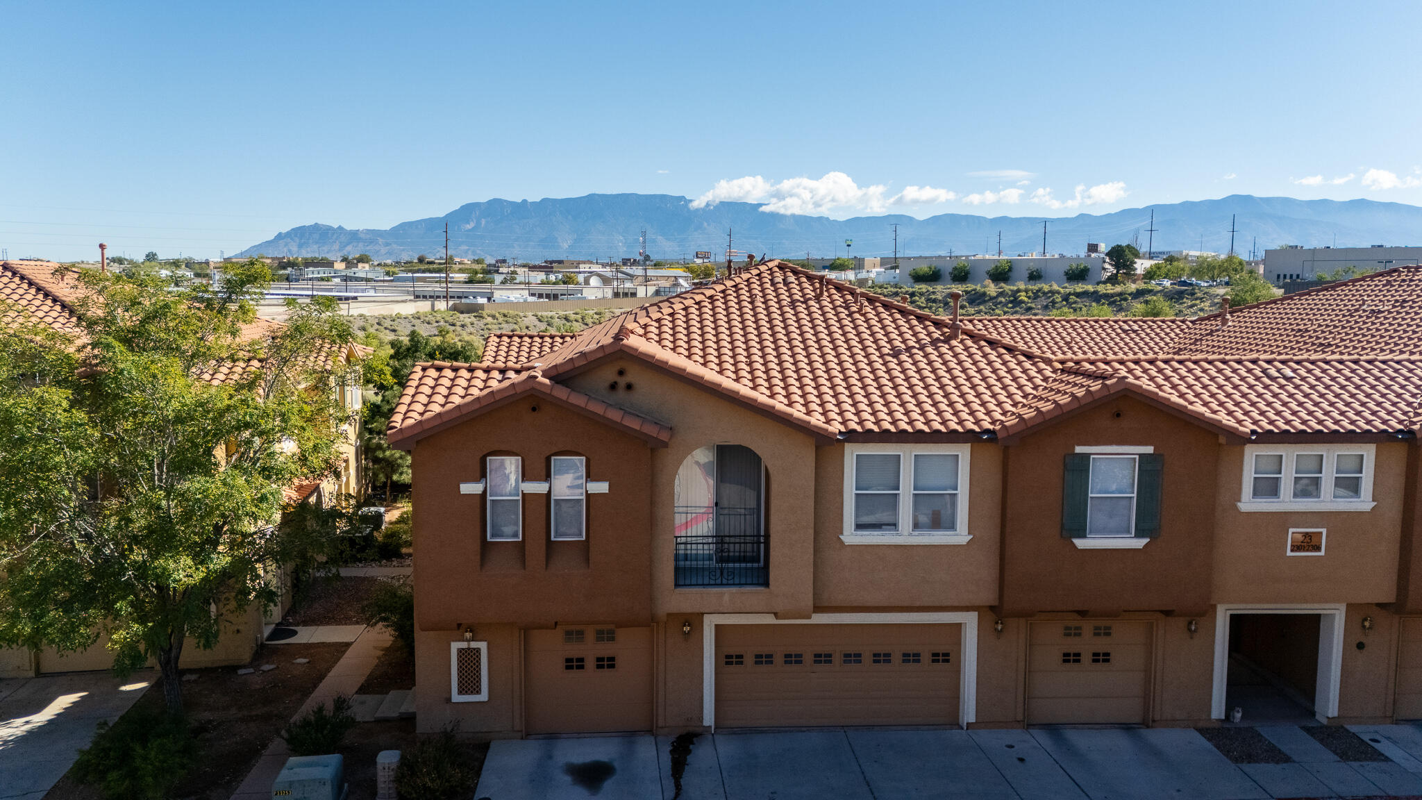 Come & see this amazing townhome is a the desirable Villas! As you enter you home you are greeted with a open floor concept large living room, with plenty of natural light, great sized kitchen with bar top, large pantry, ample amount of counter space and cabinet storage! Powder room and your 2 car garage completes your main floor. As you head yup stairs you walk into your loft that can double as a 2nd living room, office and or can be turned into a third bedroom. Your primary suite is oversized with wonder unobstructed views of the majestic Sandia Mountains, large primary bathroom With garden tub, and walk in closet! Your laundry room is upstairs and secondary bedroom and full bathroom are around the corner! Private patio, community pool & parks, tankless WH, new carpet & countertops!