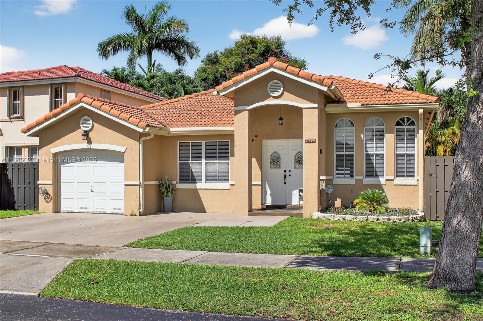 Poinciana At Sunset Lakes