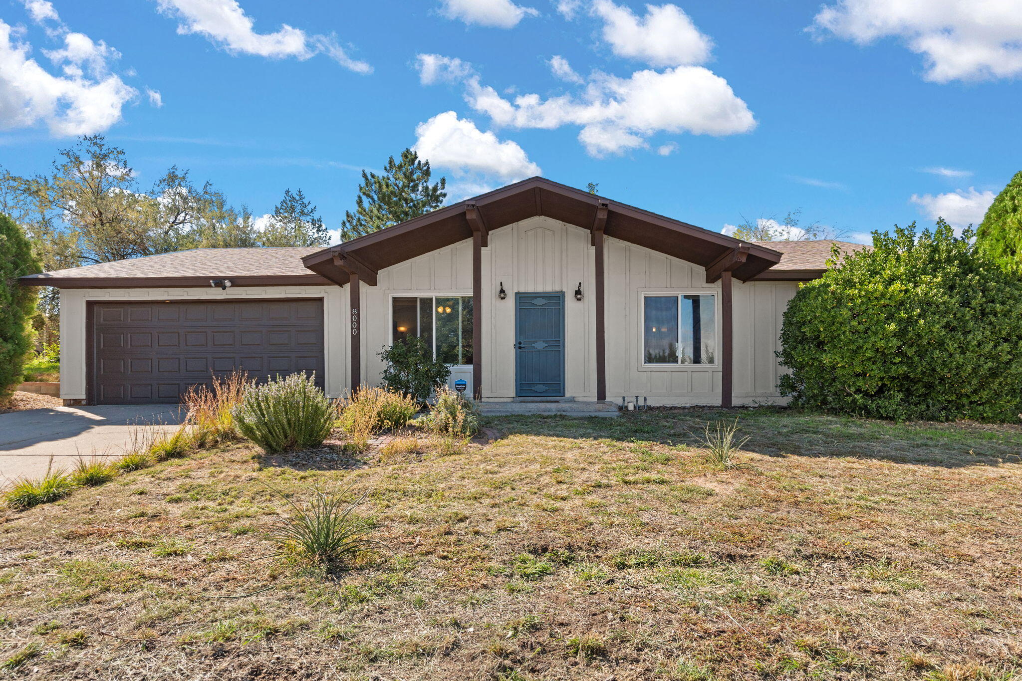 Charming and full of updates, this home is move-in ready! Fresh exterior paint gives it great curb appeal, while the updated kitchen and bathrooms shine with modern touches. Barn doors add character throughout. Step outside to enjoy your very own peach, plum, and apple trees, plus a spacious backyard porch perfect for relaxing or entertaining. Conveniently located with easy access to shopping, dining, and more, this home offers comfort, style, and function all in one. Don't miss the chance to make it yours!