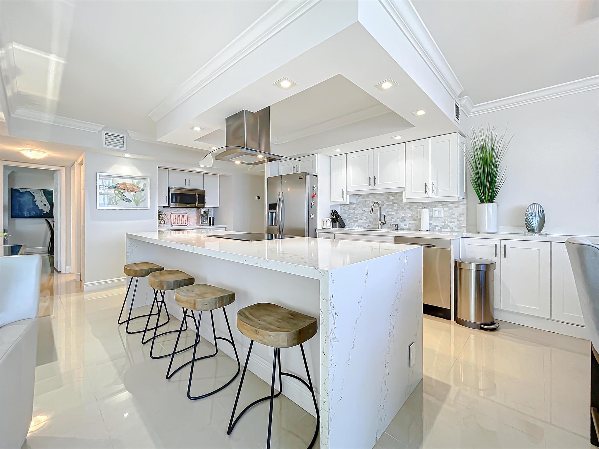 Spectacular fully updated and FULLY FURNISHED DIRECT OCEAN South East corner unit with wrap around terraces. Enjoy the ocean views as well as the sunsets to the West. Clear tempered glass balcony allows unobstructed views of the ocean. Professionally designed and decorated. Impact hurricane glass windows with remote control window treatments. Washer/dryer in the unit. Ready for the 2025 winter season! 3 Month minimum.