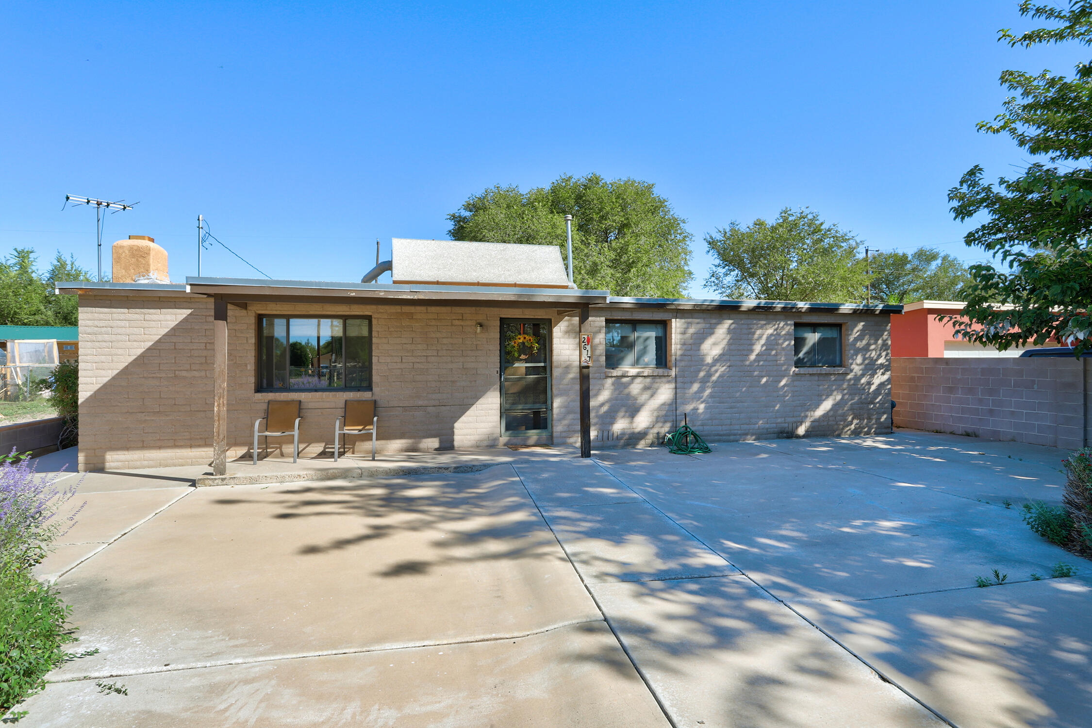 Discover charm and comfort in this well-cared-for South Valley home! Featuring 3 bedrooms and 1 bath, this property has been freshly painted inside and showcases newer vinyl laminate flooring. The inviting layout offers warmth and character, perfect for everyday living. Outside, enjoy a spacious backyard complete with a pergola patio, ideal for relaxing or entertaining. A detached 2-car garage & workshop provides excellent parking and storage. Conveniently located near schools and local amenities, this home is ready to welcome its next owner.