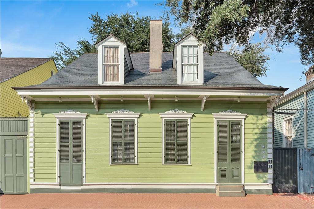 Step into the heart of New Orleans history with this stunning 3-bedroom, 2.5-bathroom residence perfectly positioned in the pulse of the iconic French Quarter. Just steps from the legendary Saint Louis Cathedral and world-famous Cafe Du Monde, this exceptional property offers an unparalleled opportunity to live among the city's most treasured landmarks and historic sites.
This meticulously updated home seamlessly blends historic charm with modern luxury. Beautiful hardwood floors flow throughout the space, while exposed brick walls tell stories of centuries past. The recently renovated kitchen features elegant granite countertops and premium stainless steel appliances, creating the perfect space for both intimate dinners and entertaining guests.
Luxurious bath amenities elevate your daily routine, while the convenient in-unit washer and dryer add modern convenience to this historic setting. Every corner of this home exudes character and charm, from the carefully preserved architectural details to the thoughtful contemporary updates. Living and owning on Orleans Avenue means immersing yourself in the vibrant culture, world-class dining, and rich history that makes the French Quarter legendary. Whether you're enjoying your morning coffee with views of historic architecture or hosting friends for an evening of jazz and joie de vivre, this home places you at the center of it all. Don't miss this rare opportunity to own a piece of New Orleans history in one of the world's most celebrated neighborhoods. Schedule your private showing today and experience the magic of French Quarter living.
