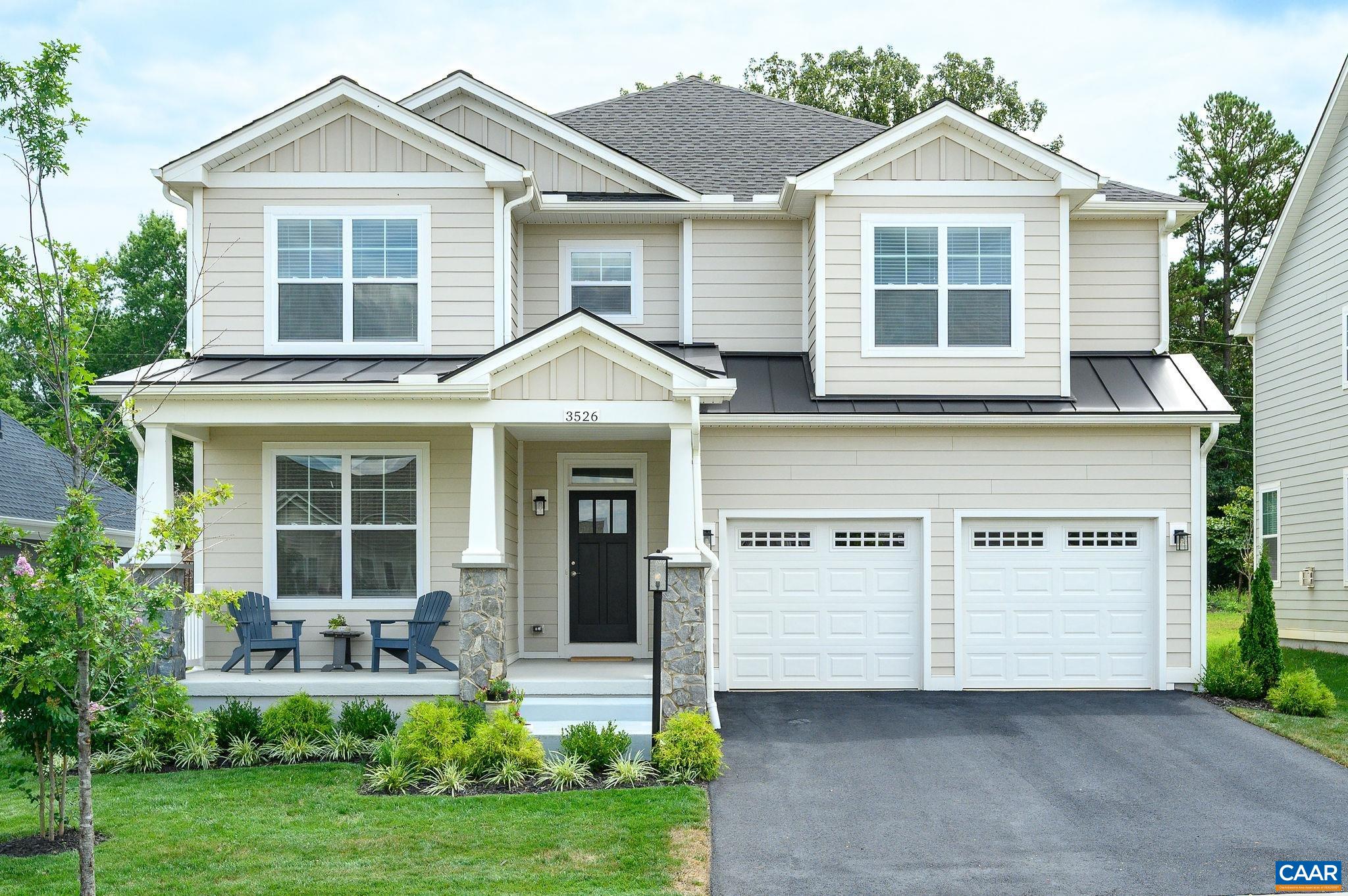 Craftsman Style Home built by Southern Development - Move-In Ready! This stunning less-than-two-year-old home offers like-new condition without the wait and is priced competitively against new construction. Enter through the welcoming foyer to discover the dramatic great room featuring soaring 18' COFFERED CEILINGS and cozy GAS FIREPLACE. The gourmet kitchen boasts a 36" GAS RANGE and wall oven, flowing seamlessly to the bright morning room. Convenient main-level office and half bath complete the first floor. Upstairs, the generous primary suite includes an ensuite bath and huge walk-in closet, plus two secondary bedrooms sharing a hall bath and convenient upper-level laundry. NO CARPET THROUGHOUT for easy maintenance. Relax on the Trex deck overlooking the flat, well-maintained FENCED backyard. This energy-efficient Pearl Gold certified home provides easy access to NGIC, North Fork Discovery Park, CHO, downtown C'ville, and 90 miles to Washington, D.C. Fiber optic internet available.