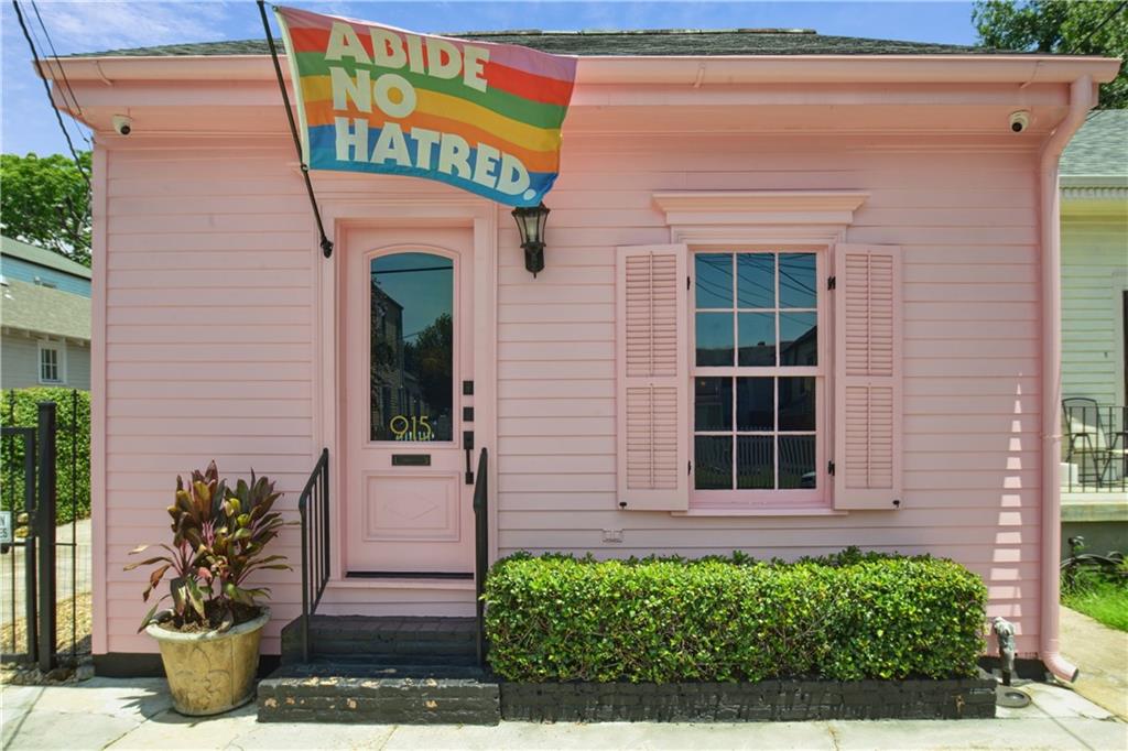This Irish Channel home is pure magic and checks every box on your list! Featuring 3 bedrooms, 2 baths, gated off-street parking for 3 cars, a sparkling pool, and a completely turn-key condition—all just 1.5 blocks from the best Magazine Street has to offer. Originally renovated in 2006, this historic Creole Cottage has been meticulously maintained and thoughtfully updated by the current owner. Highlights include white oak flooring throughout, an updated kitchen with quartz countertops and a large central island, custom cabinetry in the mudroom, floor-to-ceiling built-ins in the hall near the primary suite, fresh interior and exterior paint, improved drainage, and more. The primary bedroom comfortably accommodates a king-size bed, while both secondary bedrooms easily fit queens. The backyard is an oasis, boasting a spacious pool with tanning ledge, lush mature landscaping, and plenty of room for entertaining. Experience the best of the New Orleans lifestyle in this historic cottage that truly has it all!