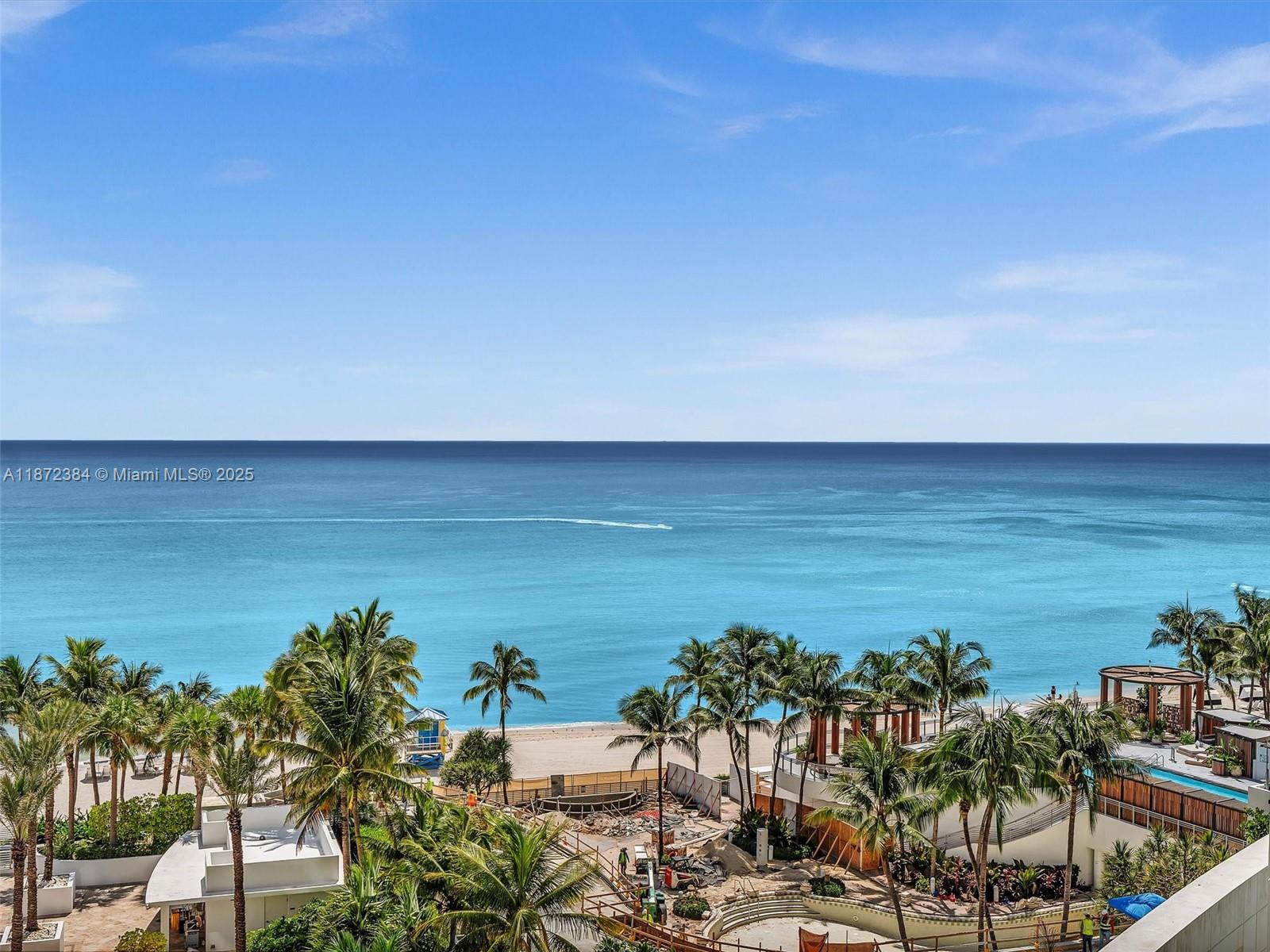 Unit comes with THREE assigned parking spaces!! This oceanfront gem boasts direct, unobstructed views of the Atlantic Ocean, the Intracoastal Waterway, and the vibrant city skyline from expansive floor-to-ceiling windows and private balconies. Step into elegance with private elevator access leading to a grand double-door entry, high 9-foot ceilings, marble flooring, and designer finishes throughout. The gourmet kitchen features granite countertops, premium Sub-Zero and Wolf appliances, while the spa-like master suite offers a whirlpool tub, dual walk-in closets, and serene vistas. Additional highlights include impact-resistant windows, recessed lighting, energy-efficient systems, and in-unit laundry.