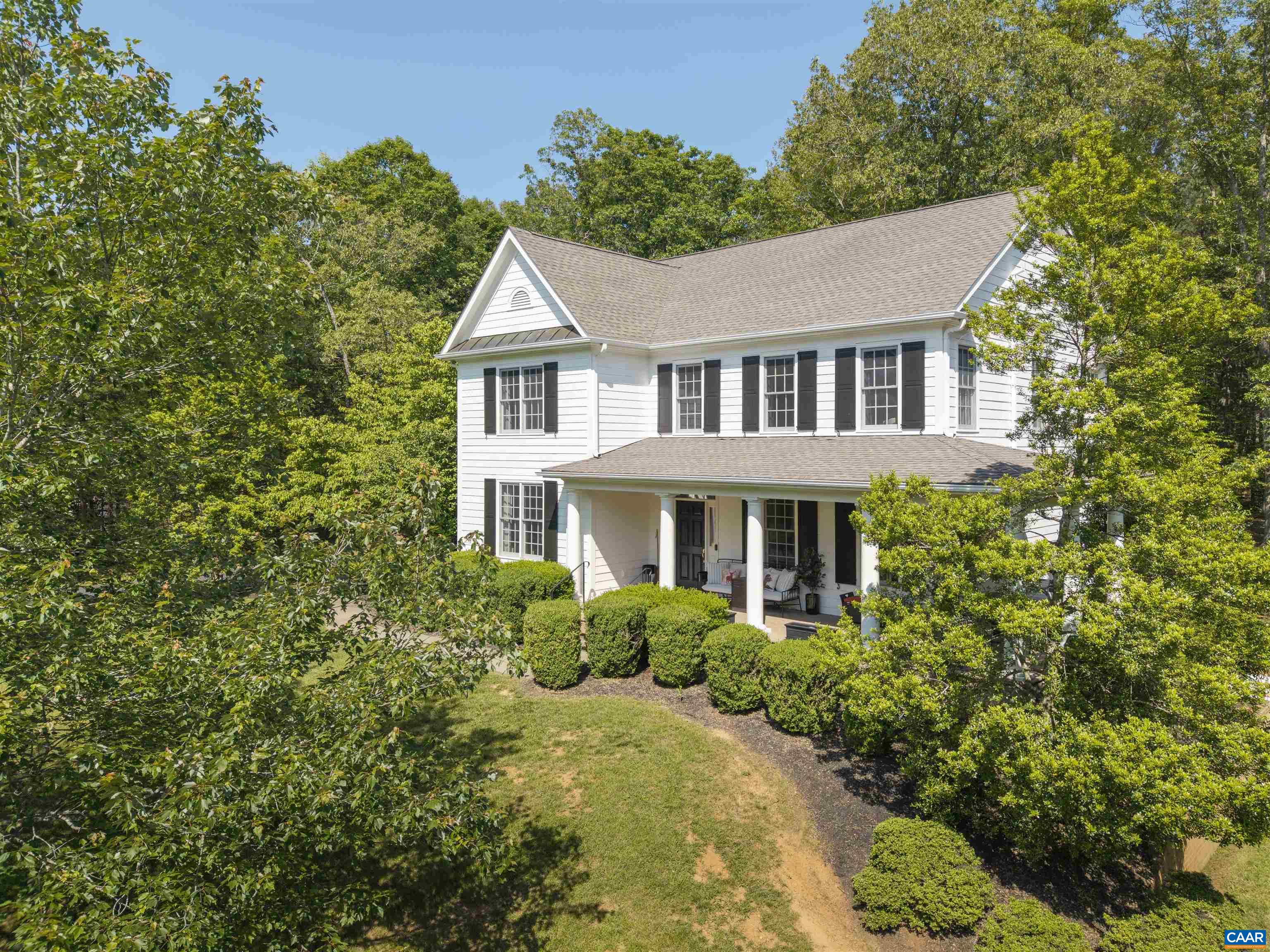 Nestled in one of Albemarle County's most desirable enclaves, this exceptional neighborhood is known for it's beauty, privacy, and distinctive character- each custom home designed to be one of a kind. This home has Six figures worth of upgrades.Flooded with natural light and featuring soaring ceilings, this residence offers a seamless blend of luxury and comfort.Step into the impressive 2-story foyer, Designer light fixtures add a sophisticated touch throughout the home.The chef’s kitchen is a showstopper—fully updated with stainless steel appliances, a custom coffee bar w/ gorgeous custom cabinetry, and striking Fantasy Brown granite countertops.The primary suite includes a luxurious bath w/ high end fixtures. The walk-out finished basement is perfect for entertaining or relaxing, featuring a large rec room with built-ins, an additional bedroom, full bath, and a generous storage area.Enjoy outdoor living with multiple entertaining spaces,including a large deck,cozy fire pit, and patio.Located in Walnut Hill, a private gated community offering top-tier amenities including a clubhouse, pool, playground, tennis courts, pond, walking trails.Just 15 min to UVA! Cafes, shops and restaurants just minutes away.