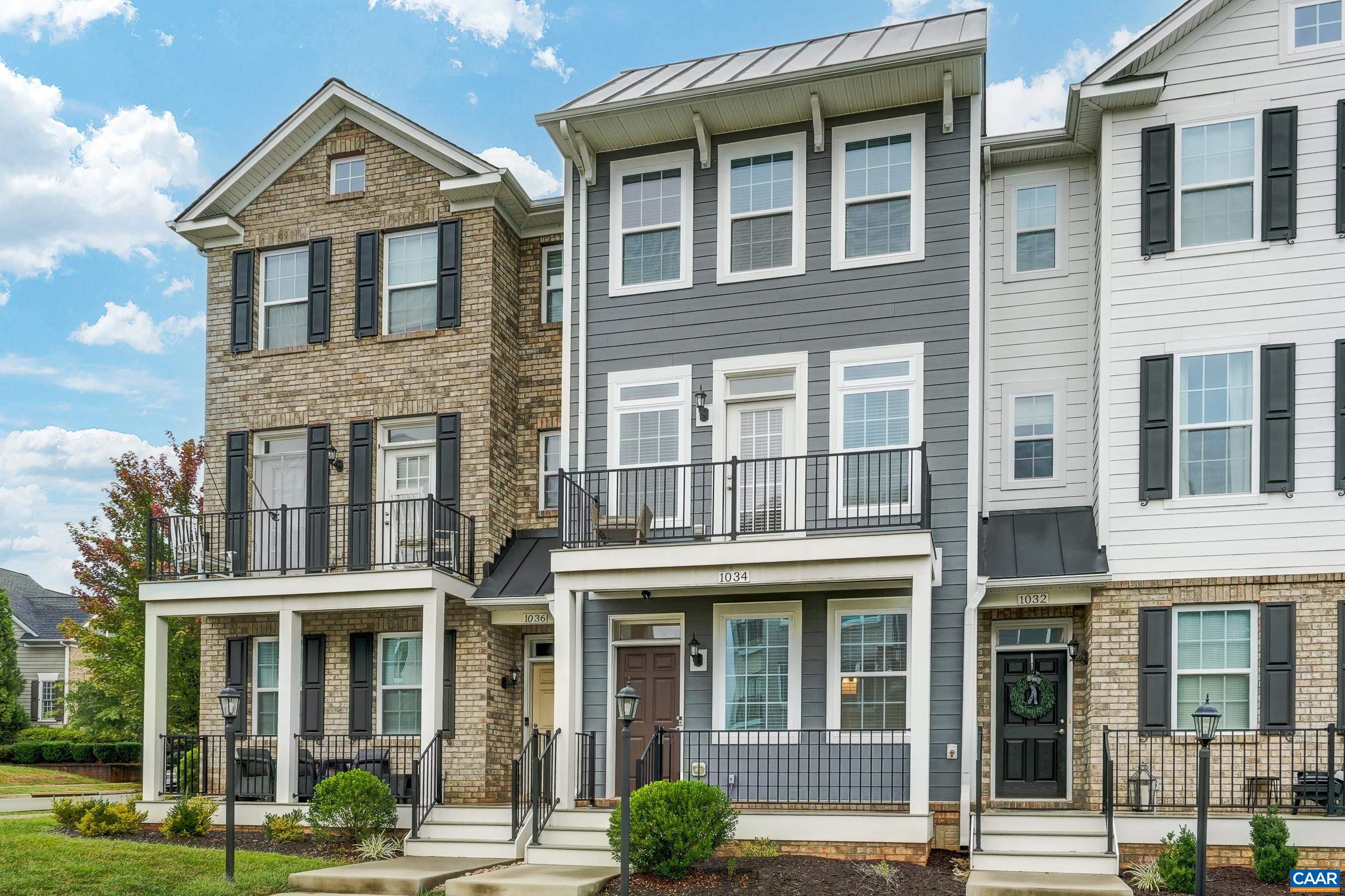 This stylish and well maintained 3 bedroom, 3 and a half bath town home in Old Trail is a must-see! Designer kitchen upgraded with solid wood cabinets, granite counter tops, subway-tile backsplash and stainless steel appliances.  Open living room with ceiling fan flows into the kitchen, dining area, and private rear deck. Convenient half bath on main living area. 2 bedroom suites with private bathrooms and walk in closets, and laundry on top floor. Primary suite features a frameless glass shower with frameless glass doors. Third bedroom/home office and full bathroom on lower level make a great guest space! Two zone heating/ cooling with programmable Ecobee thermostat.  Grill or dine on the composite rear deck or watch the sunset from the front balcony. Rear one-car garage with driveway space for an additional car. Outstanding location in Old Trail is walkable to shops and restaurants, and all three local schools!