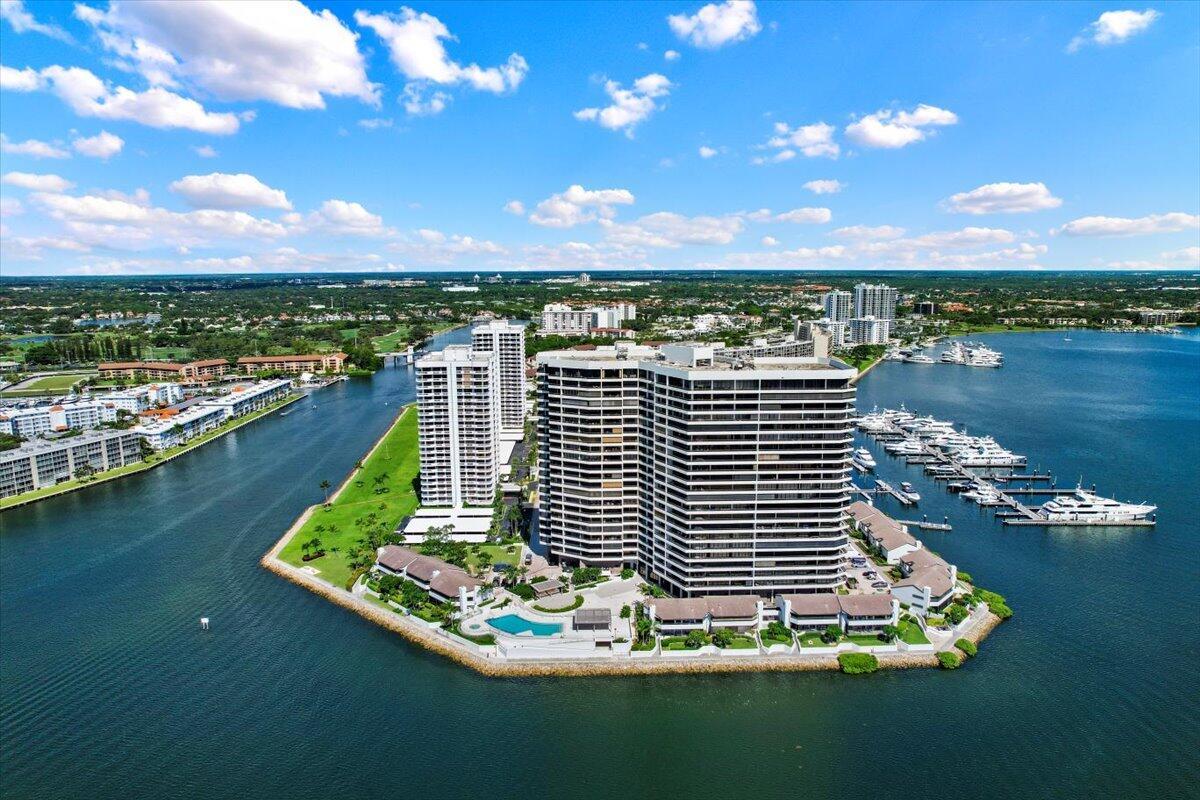 Experience refined coastal living in this beautifully updated residence at 100 Lakeshore Drive, Unit 1854. Perched high above the Intracoastal, this elegant home offers breathtaking panoramic views of the ocean, marina, and city skyline.The updated kitchen features sleek cabinetry, modern appliances, and ample counter space--perfect for everyday living or entertaining in style. Enjoy seamless indoor-outdoor living from the spacious balcony, recently restored and ideal for morning coffee or sunset cocktails.The primary bedroom is a serene retreat, enhanced with Hunter Douglas electric shades for comfort and convenience. Every detail reflects quality and care in this move-in-ready home.Residents of Lakeshore Tower enjoy resort-style amenities including a waterfront pool, fitness center