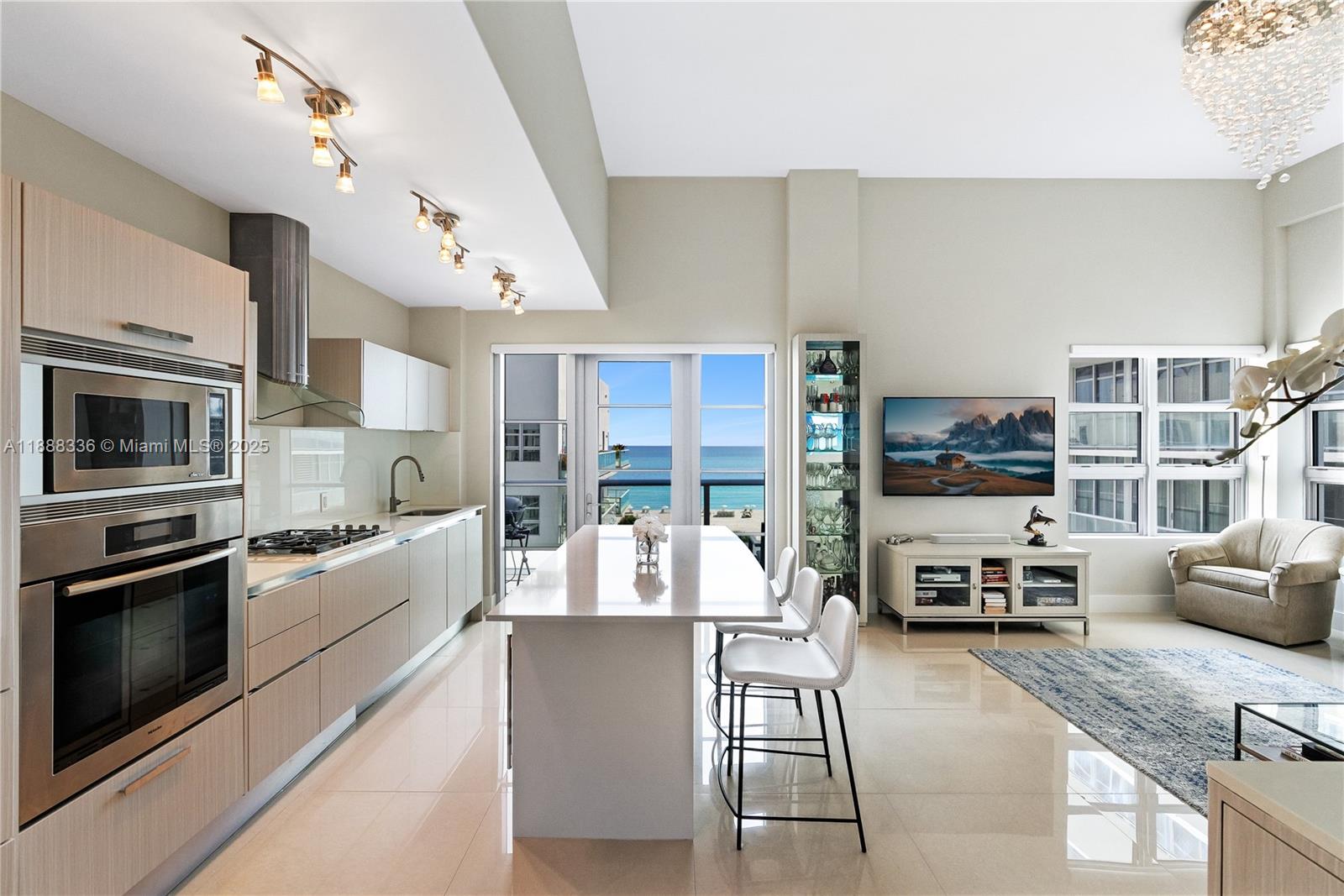 A Living Room With Furniture And Kitchen View North Miami: Stunning Design Ideas
