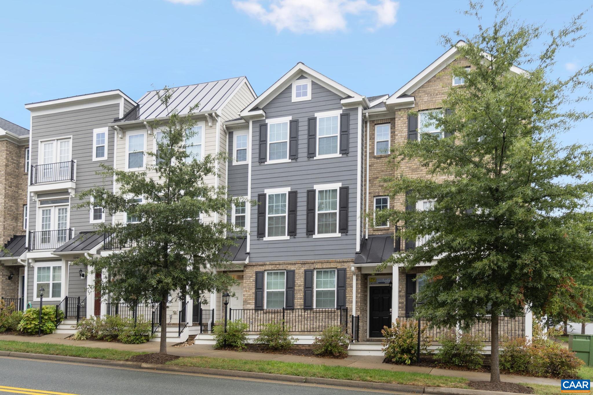 Discover low-maintenance living in Old Trail. This 4-bedroom, 3.5-bath townhome has everything you need. Enjoy a main-level bedroom and bathroom for easy access; stainless-steel appliances; sleek granite countertops; hardwood floors; a 2-car garage; fresh paint; brand-new carpet; and a laundry room conveniently located near the bedrooms on the third level. The home is Pearl Certified, with energy-efficient EcoSmart construction and a third-party HERS score, ensuring quality and comfort. Stroll to nearby coffee shops, restaurants, ACAC Fitness, Club Pilates, Old Trail Golf Course, and scenic trails with stunning Blue Ridge Mountain views. Located just 20 minutes from Charlottesville, come claim your spot in this welcoming community.