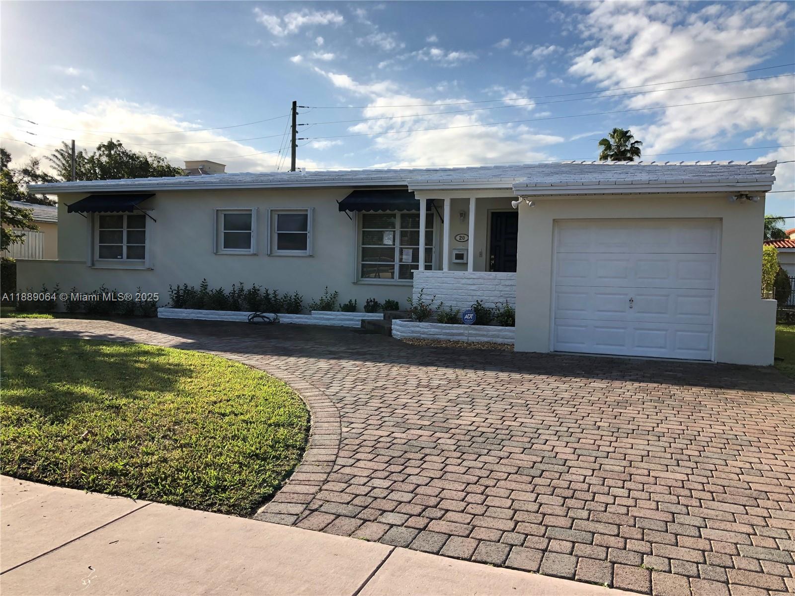 Coral Gables urban living at it's best! This impeccable 2 bedroom and 1.5 bathroom single family home with a 1 car garage sits on a 7,500 sqft lot. The home has as updated kitchen with brand new stainless steel appliances and original hardwood floors throughout. Enjoy your sunny Sunday afternoon under the electronic retractable awning to stay cool. The home is within walking distance to all the shops and restaurants in Downtown Coral Gables. Walk to Ponce De Leon and hop on the trolley or rent an electric scooter for a ride around town.