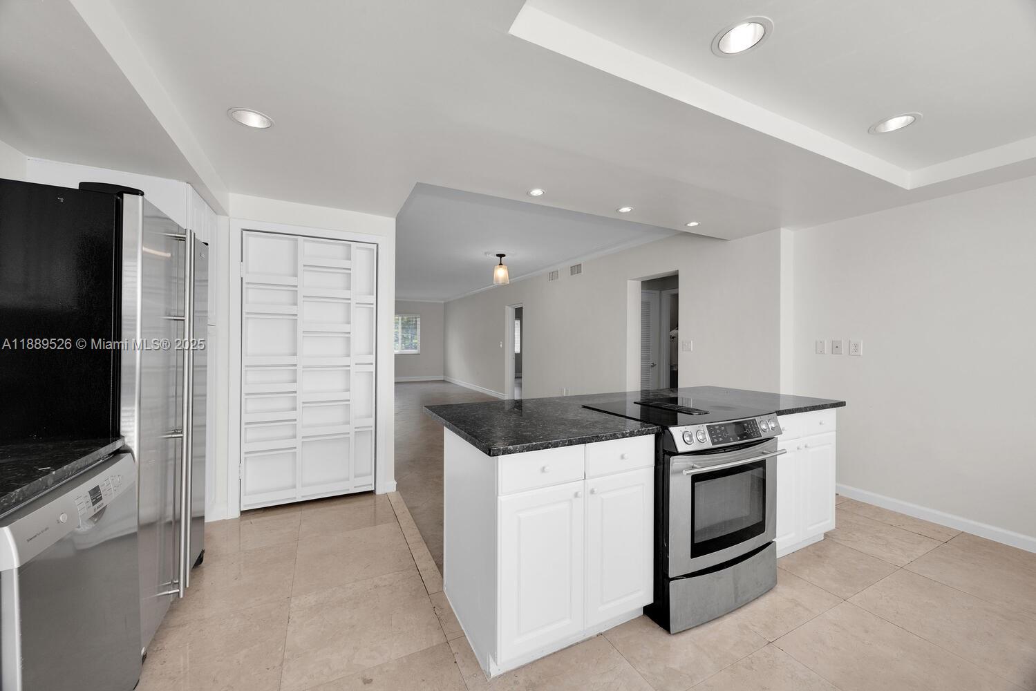 spacious, carefully maintained and updated, washer and dryer inside unit, personal garage with indoor parking and storage.
