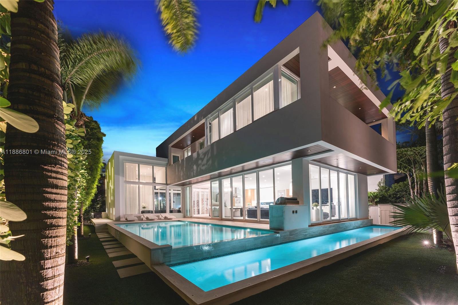 Welcome to 4433 N Bay Rd, a definitive statement of modern luxury on Miami's most exclusive stretch, placing you among icons. This meticulously curated compound has been masterfully reimagined in 2025 into a bold vision for the 21st century presented in flawless turn-key condition, the 3,534 sf sanctuary includes its unparalleled collection of custom furnishings and art. Its strategically elevated site offers invaluable peace of mind. Inside, discover soaring volumes, a climate-controlled glass wine cellar, and Venetian plaster details. Outside, your private resort features a transformative heated saltwater pool and professional-grade BBQ. This is a legacy property for the discerning few. It is not an opportunity; it is an acquisition. Your future on Billionaire's Road awaits.