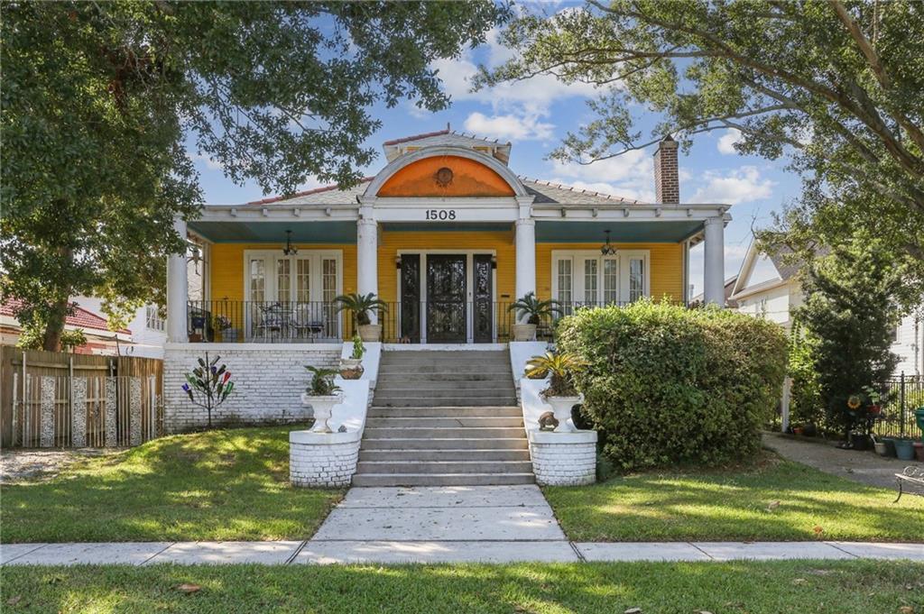 Restore this architectural gem or reinvent the site with a beautiful custom new construction. Situated on oversized/irregular lot in prime Old Metairie location. Circa 1919, this home offers both charm and versatile living. Period details include hardwood floors, original windows, French doors, intricate millwork, vintage hardware, a working fireplace, decorative chandeliers and ceiling medallions. Dramatic front staircase leads to expansive front porch. Formal living and dining rooms, original kitchen, breakfast room, office, three roomy bedrooms and two full bathrooms complete the first level. The lower level features a private one-bedroom, one-bath accessory unit ideal for guests, in laws and more! The lower level also includes a bonus space with a wet bar and half bath creating a flexible footprint for use as a family room, home gym, or entertainment zone. Third level optional bedroom or playroom with half bath. Outside, enjoy two driveways for off-street parking, a covered patio, a fenced backyard, and a large shed for storage or workshop. Close proximity to Pontiff Playground and Metairie Road. 2022 Roof. Flood zone X.