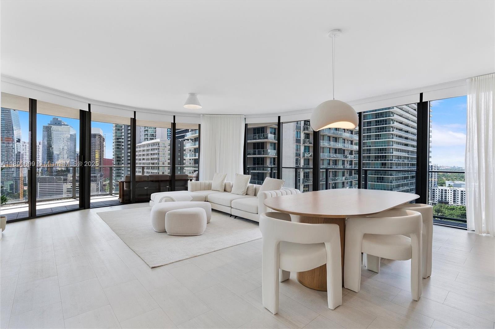 Meticulously designed to the last detail, this fully furnished home features exquisite designer décor, a custom Snaidero kitchen, and top-of-the-line Miele appliances, creating a seamless blend of elegance and functionality within Miami’s most iconic architectural landmark.

Boasting the largest floor plan available for tower residences, this exceptional 3-bedroom, 3.5-bath residence is wrapped in floor-to-ceiling windows and elliptical glass balconies, offering dramatic panoramic city views from every room.

Residents enjoy access to an exclusive 64th-floor rooftop deck, world-class spa, state-of-the-art fitness center, and resort-style pool. Nestled in the heart of Brickell, steps from Mary Brickell Village and Brickell City Centre, this home embodies elevated living at its finest.