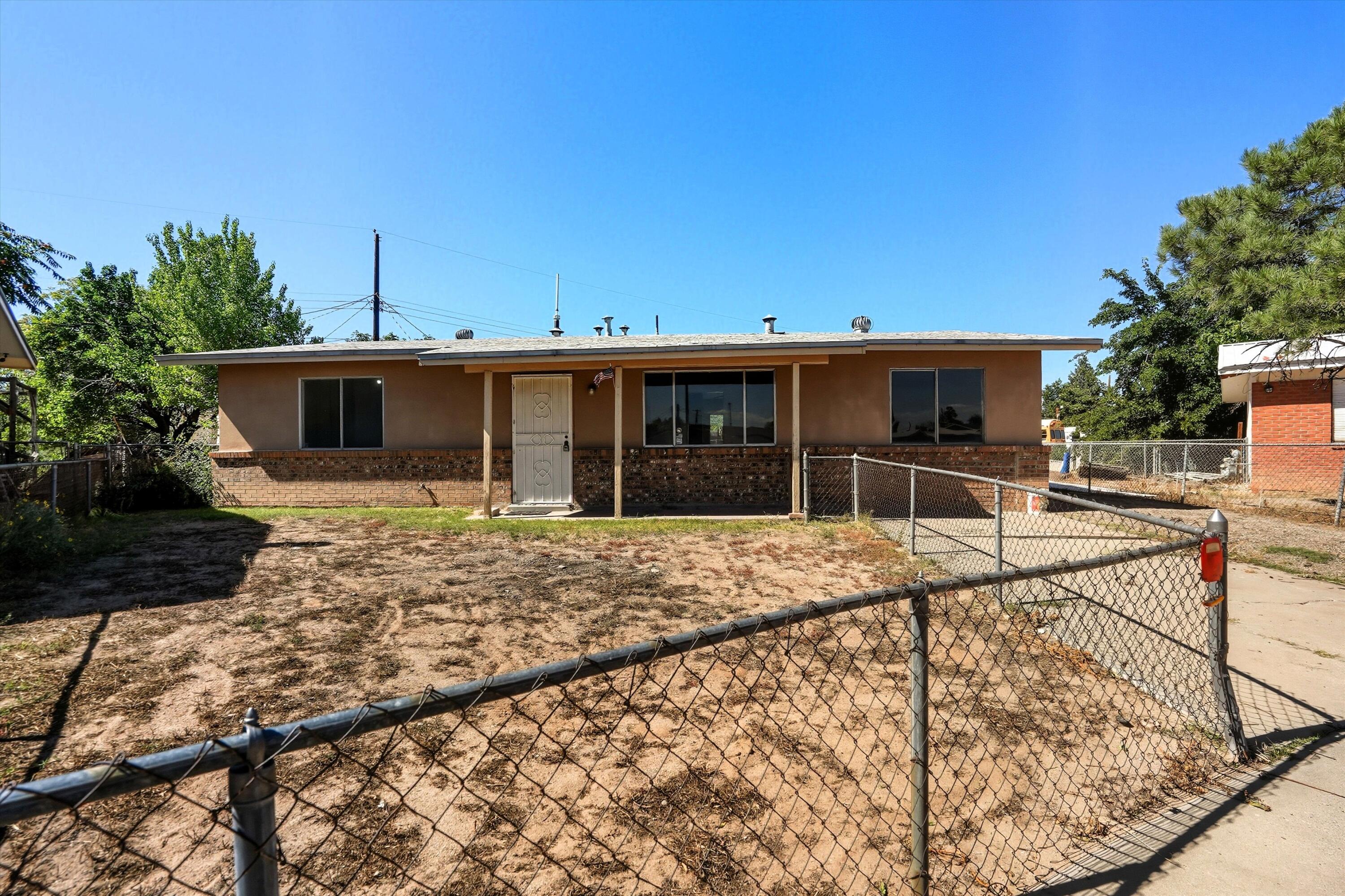 Welcome to 1435 Loma Vista Dr NW! A great opportunity to customize a 5-bed, 2-bath home with 1,433sq. ft. on a 0.37-acre lot in a convenient Albuquerque location. This property offers solid bones and a traditional layout--perfect for buyers ready to remodel and capture sweat equity. The spacious backyard is ideal for entertaining, gardening, or expansion. Close to Old Town, Downtown,  I-40/I-25, and the Rio Grande Bosque trails. With its prime location and potential, this home is ready to shine!