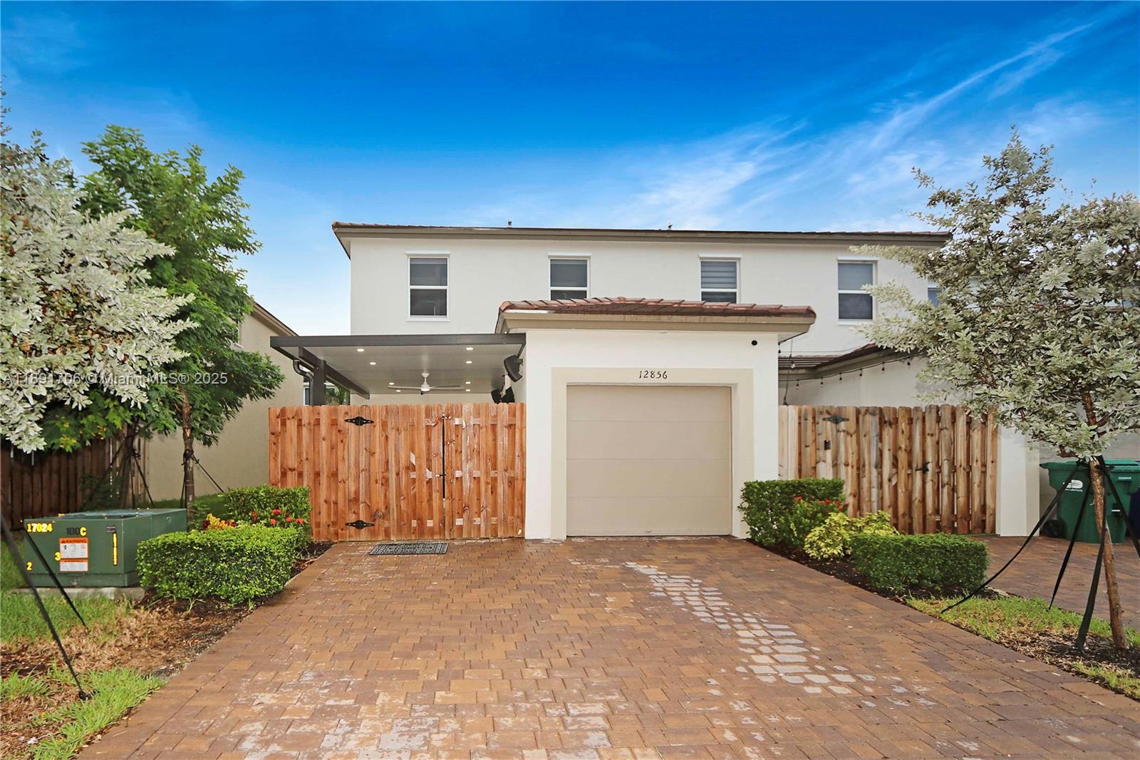 Beautiful and modern townhouse featuring 3 bedrooms and 2.5 bathrooms in the heart of Homestead. This home offers a bright open floor plan, elegant kitchen with quartz countertops, stainless steel appliances, and plenty of storage. Spacious bedrooms, walk-in closet in the master suite, and a private fenced patio perfect for entertaining. Washer and dryer included. Excellent location near the Turnpike, shopping centers, and top schools. Move-in ready and easy to show!