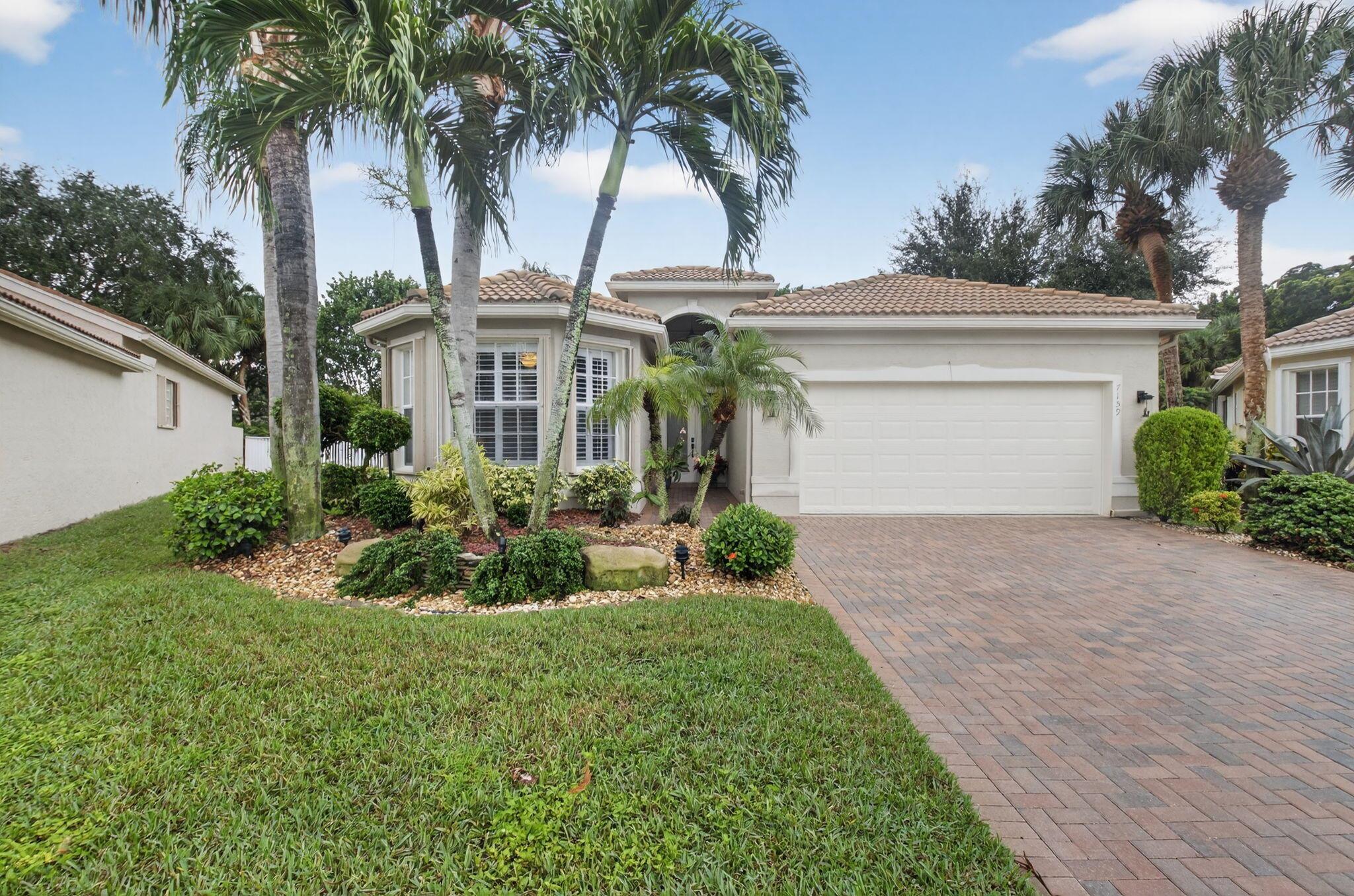 Fabulous updated 4BR/2.1BA Gibraltar model w/wall opening sits on oversized fenced in lot (8396 sq ft) w/room for a pool. Enjoy your private in-ground SPA with new heater & pump, plus 20' motorized retractable awning perfect for relaxing or entertaining. Contemporary kitchen w/quartz counters, updated island & pullouts in all cabinets, Both kitchen & baths shine with quartz finishes. Plantation shutters add timeless style. Additional highlights include custom closet systems for organized living, extended garage w/epoxy flooring, accordion shutters for all windows. With its open, modern layout and luxurious touches, this home truly stands out--move-in ready! Enjoy resort-style clubhouse, cafe, fitness center, lap & resort pools, tennis, pickleball, bocce, billiards, social events & more.
