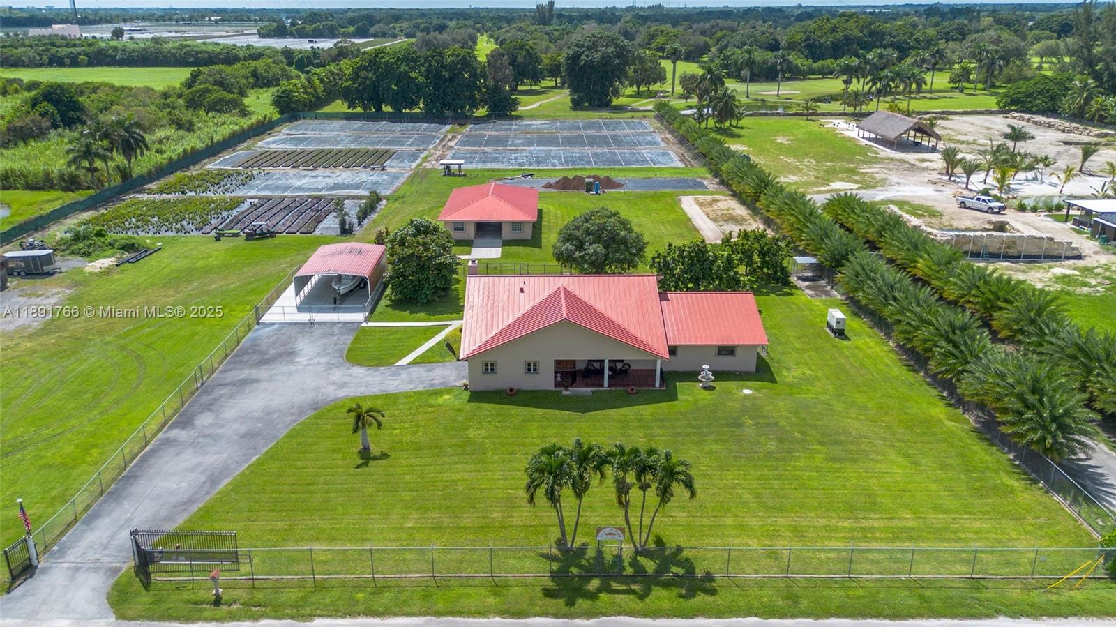Escape to the tranquility of the Redland with this charming 3BR/2BA home + Horse Stables on nearly 5 acres. Ideal for equestrian living or a private retreat, it features a 2-car garage, 8 horse stables, and 1BR/1BA helper’s quarters. A thriving nursery generates $2,000/month, adding income potential. Enjoy spacious interiors with high ceilings that flow to lush outdoor areas, perfect for entertaining or relaxing. Additional highlights include a metal roof, standby generator (powers home up to 7 days), and an agricultural exemption for tax savings. Redland Living at its finest!