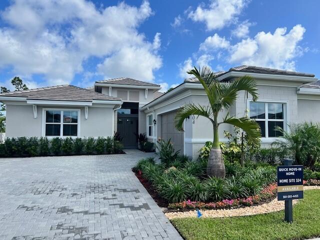 Welcome to the Shelby, a quick move-in home featuring 3 bedrooms and 3 bathrooms, designed for modern Florida living. An inviting covered entry opens to a foyer with tray ceiling, leading to an expansive great room and dining area with elegant tray ceilings and views of the covered lanai and private pool perfect for entertaining or relaxing outdoors. The designer-appointed kitchen boasts a large center island with breakfast bar, ample counter and cabinet space, a generous pantry, and overlooks a bright casual dining area. Additional highlights include a versatile flex room, centrally located laundry, 2-car garage, and ample storage. This Shelby home blends comfort, style, and effortless indoor-outdoor Florida living.