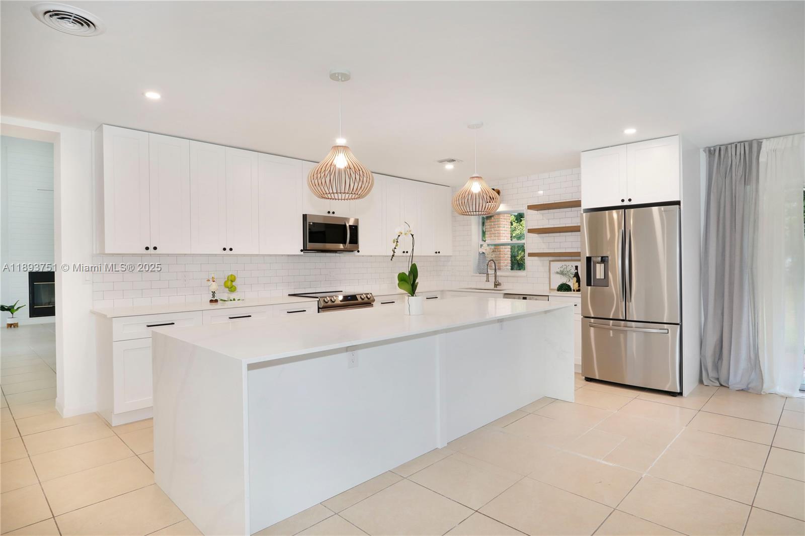 Beautifully renovated 4 bed/2.5 baths Pinecrest home featuring vaulted ceilings, a wood-burning fireplace, a stunning new kitchen and bathrooms. The covered terrace opens to a spacious and lush backyard — perfect for relaxing or entertaining. Nestled on a quiet, no-traffic street surrounded by elegant estates. Top-rated public and private schools. A truly charming home in one of most desirable neighborhoods. Call today!