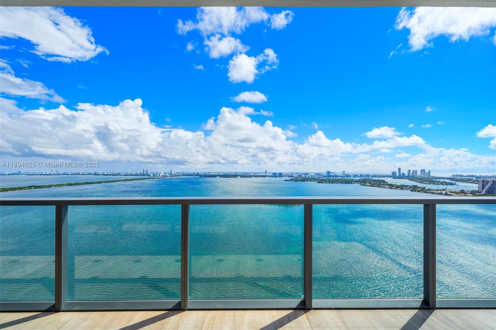 This exceptional residence offers breathtaking, unobstructed views of Biscayne Bay, Miami, and Miami Beach from its expansive balcony. Every detail exudes sophistication-from smart home technology and Vena Grigio limestone floors with black marble accents to a private elevator leading to a foyer with custom double doors crafted from mirror, metal, and walnut wood. The living area features a stunning walnut accent wall with a mirror framed in beautiful marble that seamlessly transforms into a television, blending modern innovation with timeless design. Residents enjoy world-class amenities including a waterfront fitness center, spa, grand salon, valet parking, EV charging stations, and more.