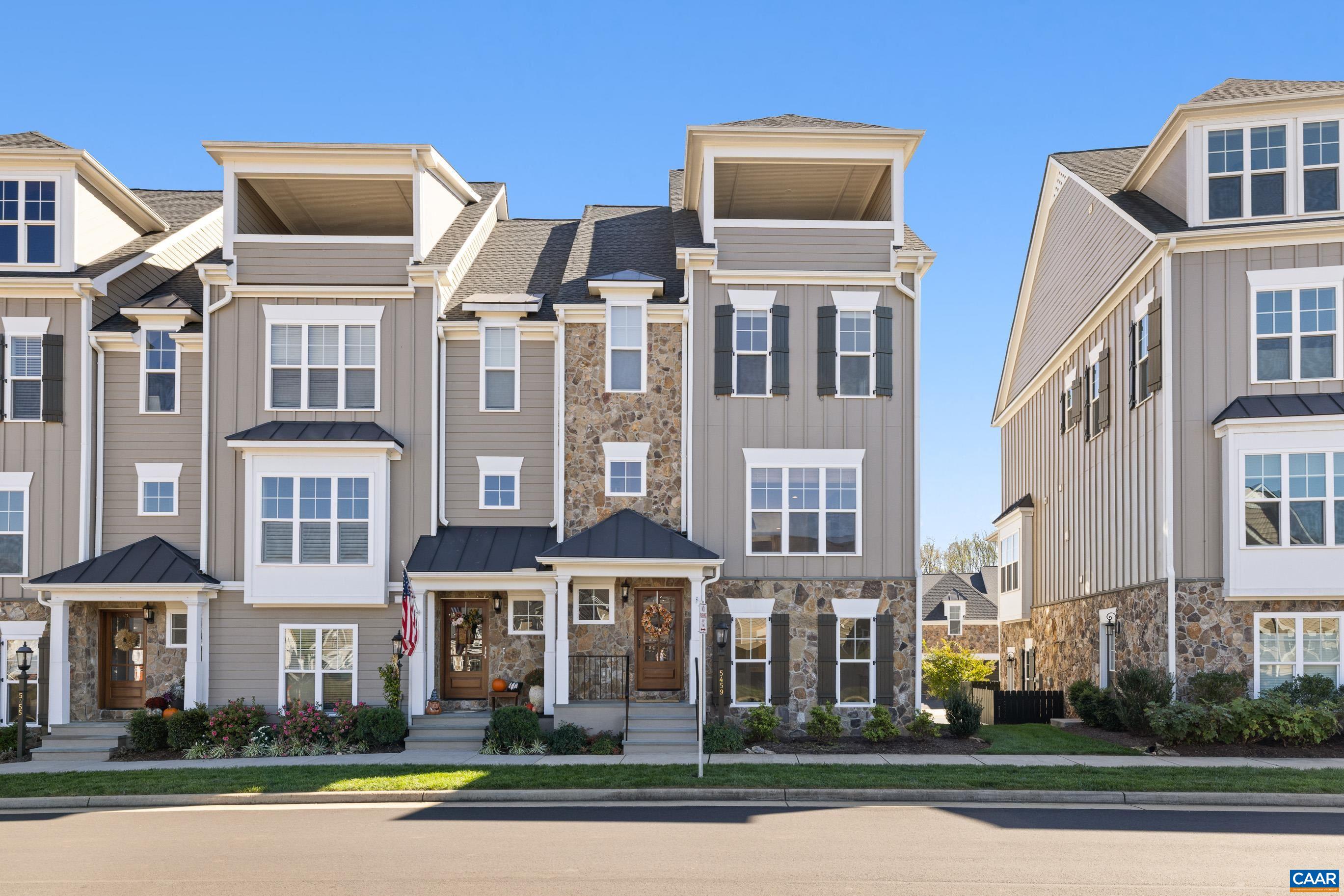 Mountain Views, Elevators, Sidewalks, Oh My! Come see this LUXURY TOWNHOME in the heart of Old Trail's walkable neighborhood. This CRAIG BUILDERS home was NEWLY BUILT in 2021 and has all the convenience of new construction without the wait. Equipped with an IN HOME ELEVATOR, every floor of the home is make completely accessible. As you enter the first floor of the home, you'll find a bedroom that could easily be used as an office, study or rental space, complete with its own kitchenette, bathroom, and exterior exit. The main level found on the second floor, has an OPEN FLOOR PLAN with plenty of space for entertaining, a comfortable great room, and tons of NATURAL LIGHT. The 3rd floor, holds the primary bedroom and bathroom complete with 2 separate shower heads, along with an additional bedroom with its own en suite bathroom. On the fourth floor, you are met with breathtaking MOUNTAIN VIEWS from both sides of the home, but most notably from the home's ROOFTOP TERRACE. This home is exceptional and not one you want to miss.