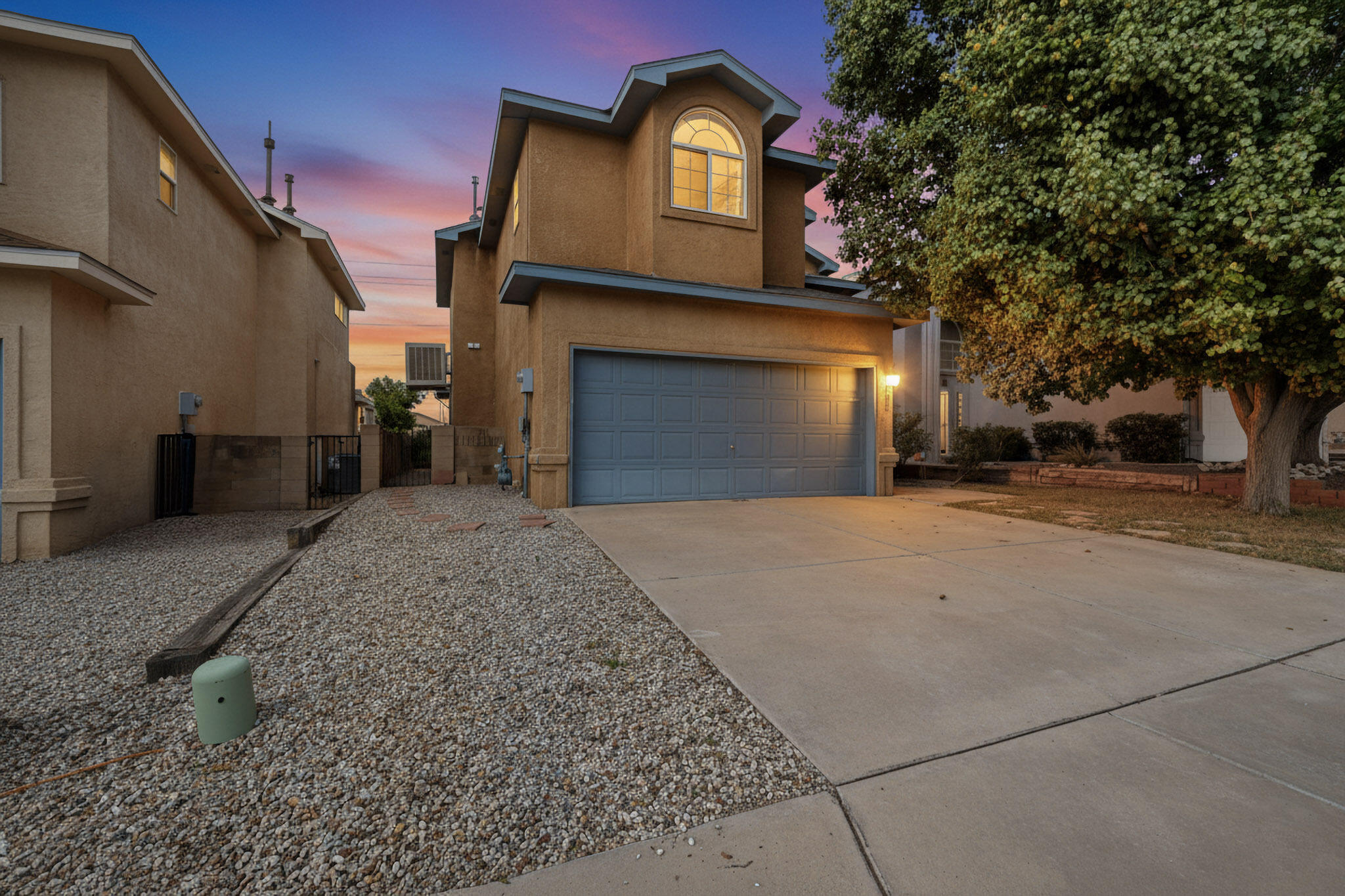 Welcome to this lovely home in Falcon Ridge!  Foyer is full of natural light and brings you into a large  living area with a gas log fireplace.  Dining area opens to both kitchen and back patio. Primary bedroom is spacious, with walk-in closet, and has a full bathroom, and double sinks.  2nd bedroom features a nice sized balcony with mountain views.  3rd bedroom is right off the 2nd full bathroom.  Laundry room and 1/2 bath lead to the finished 2 car garage with auto openers.  Wonderful location close to shopping, restaurants, schools and more!  Come see this home, and then make it your own!