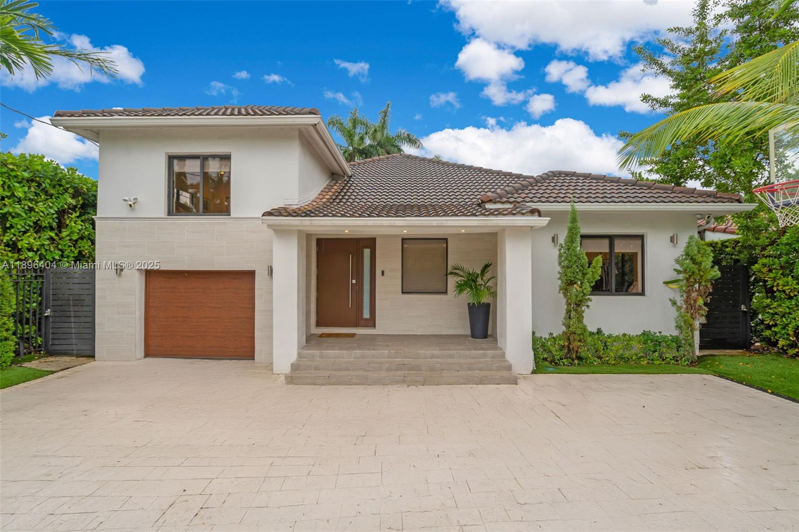 Fully renovated 3-bed, 3.5-bath smart home on prestigious Alton Rd in Miami Beach. This move-in ready residence features a great flow w/ open-concept living, en-suite bedrooms, a spacious family room that could be used as a 4th bed, private office, laundry area, & a walk-in pantry. The home is flooded w/ natural light & enhanced w/ smart lighting inside & out. Energy-efficient SS appliances, impact windows/doors, built-in speakers, security cameras, & gated entry for peace of mind.
Large backyard offers an elegant travertine patio, built-in grill, & ample space to build a pool.
Plenty of storage throughout, plus 1-car garage & spacious driveway for 4 addl' vehicles. This stylish family home, delivers comfort, convenience, & luxury in one of Miami Beach’s most desirable locations.