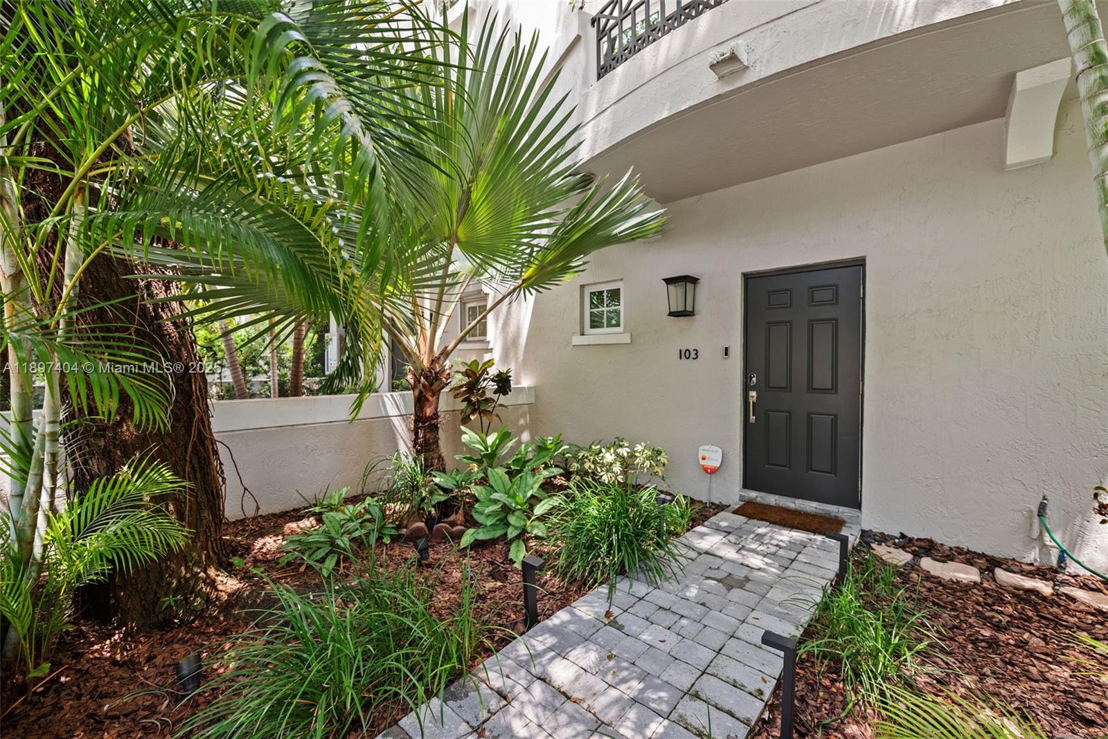 This beautifully remodeled tri-level townhouse in the heart of Coral Gables, very close to the dining and financial district, offers the perfect ambiance of timeless elegance. Step inside to discover wood floors that flow seamlessly throughout the spacious living areas. The third level has all the bedrooms with the primary bdrm having a custom walk in closet. The updated bathrooms exude sophisticated finishes and fixtures. Enjoy the convenience of private gated entries, providing an extra layer of security and exclusivity. The unit boasts two covered parking spaces, laundry in the First level of townhome. The only one available in this sought-after neighborhood. With a newer roof and low HOA fees, you can move in with a peace of mind and enjoy all the benefits of a well-maintained home.