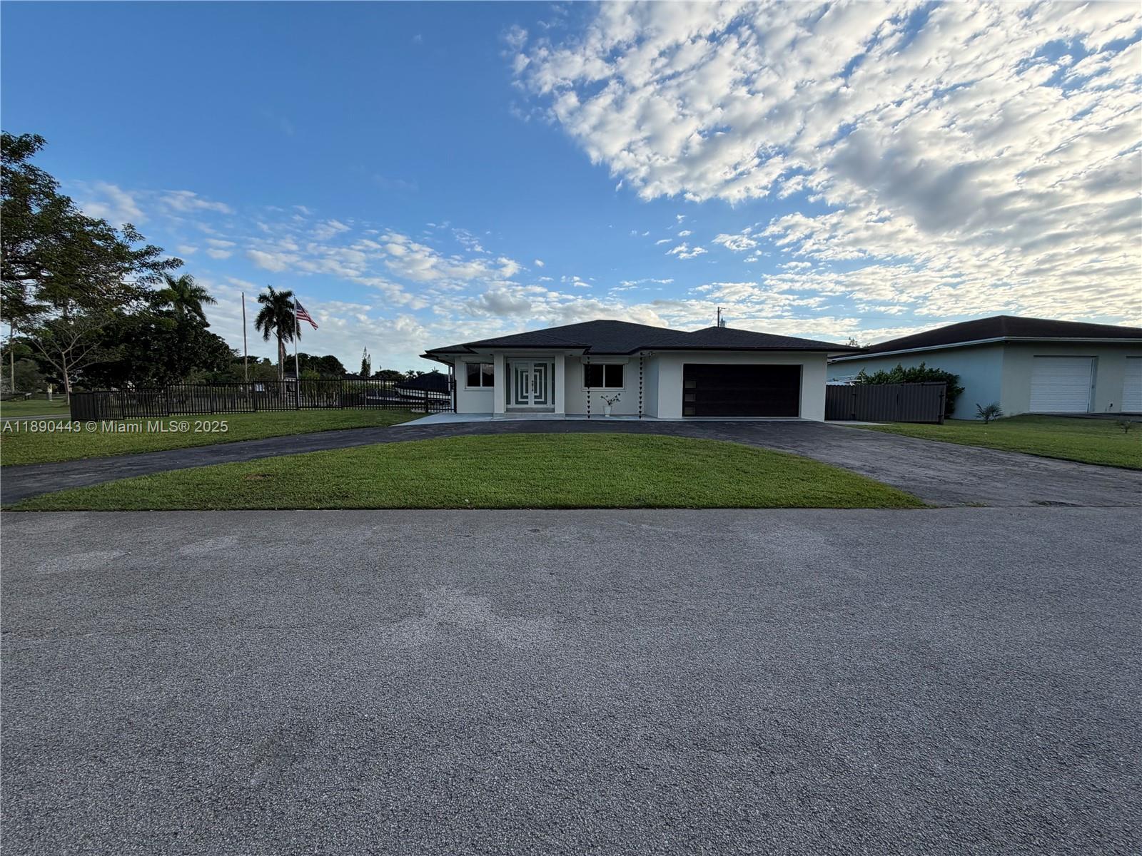 Calling all golfers and non-golfers alike! Discover this spectacular corner home featuring 4 bedrooms, 3 bathrooms, and 2 master suites with stunning golf course views right from your backyard.

This beautifully maintained property includes a brand-new roof (2024, done with permits), hurricane-impact doors and windows, and roll-down shutters for extra storm protection. The screened-in patio with a full outdoor kitchen is perfect for entertaining or simply relaxing while enjoying peaceful golf green scenery.

Located in a quiet, residents-only area, this home offers the privacy of a secluded retreat while still close to all conveniences. Don’t miss this opportunity to own your own piece of paradise in the Redlands — homes like this rarely become available!